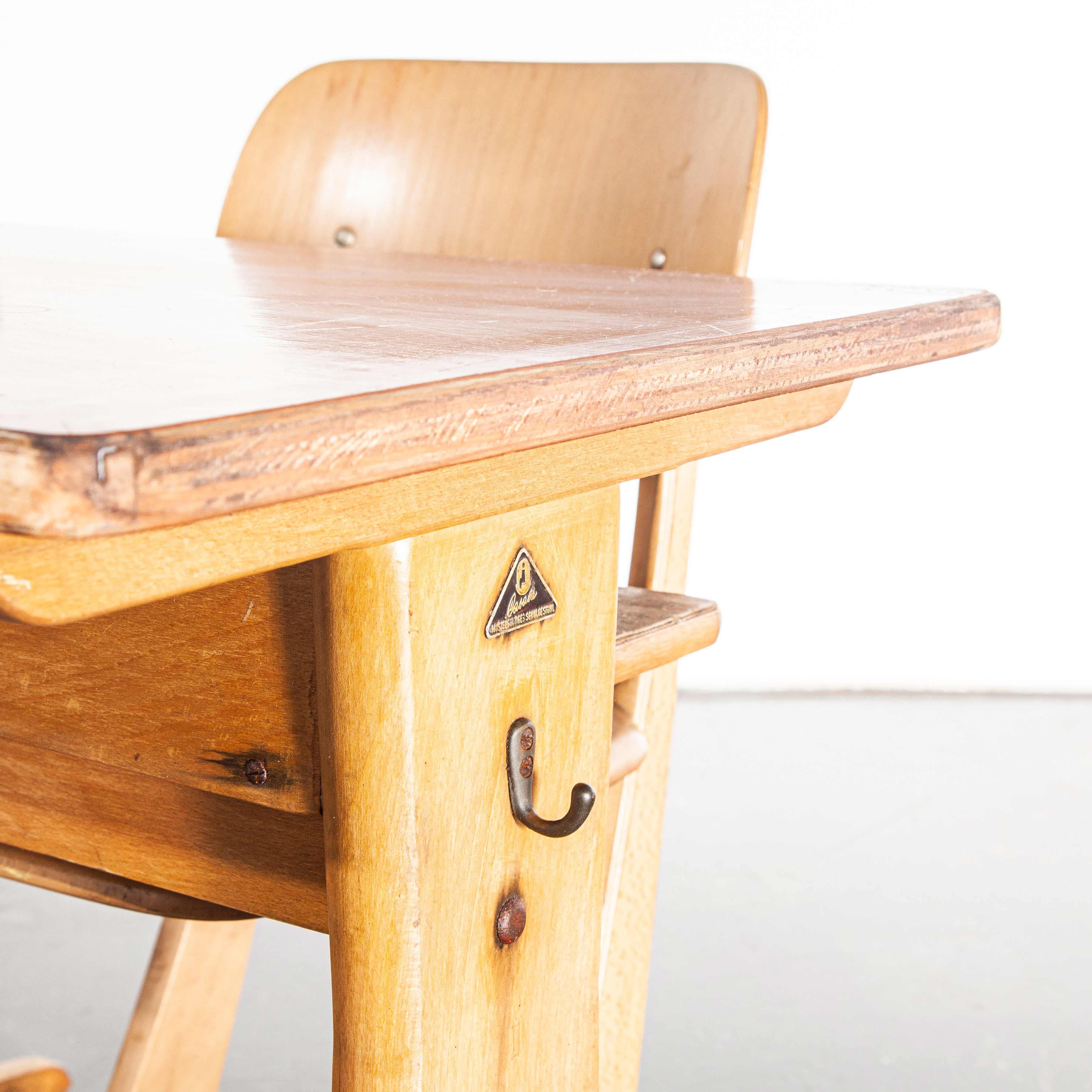 1950s children’s school desk
1960s Casala children’s desk and chair set. Casala is one of Germanys best known furniture producers still producing to this day. In our view the 1960s was their heyday. These practical slightly Scandi school