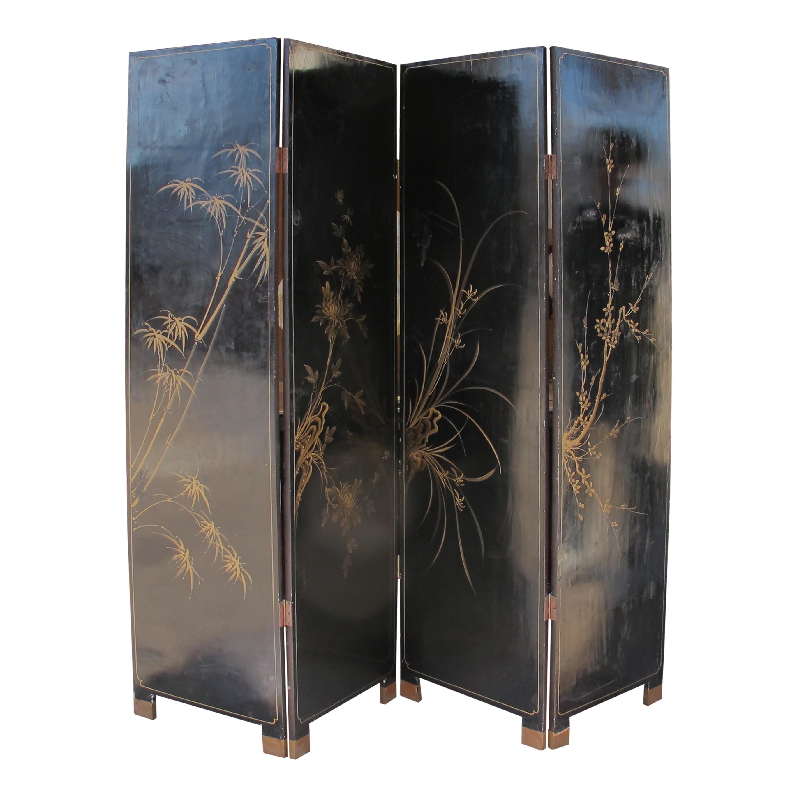 The front of the screen features a trompe-l'œil depiction of bookshelves filled with meticulously painted books, scrolls, and manuscripts adorned with Chinese calligraphy in vibrant blue, green, red, and gold hues. The realistic three-dimensional
