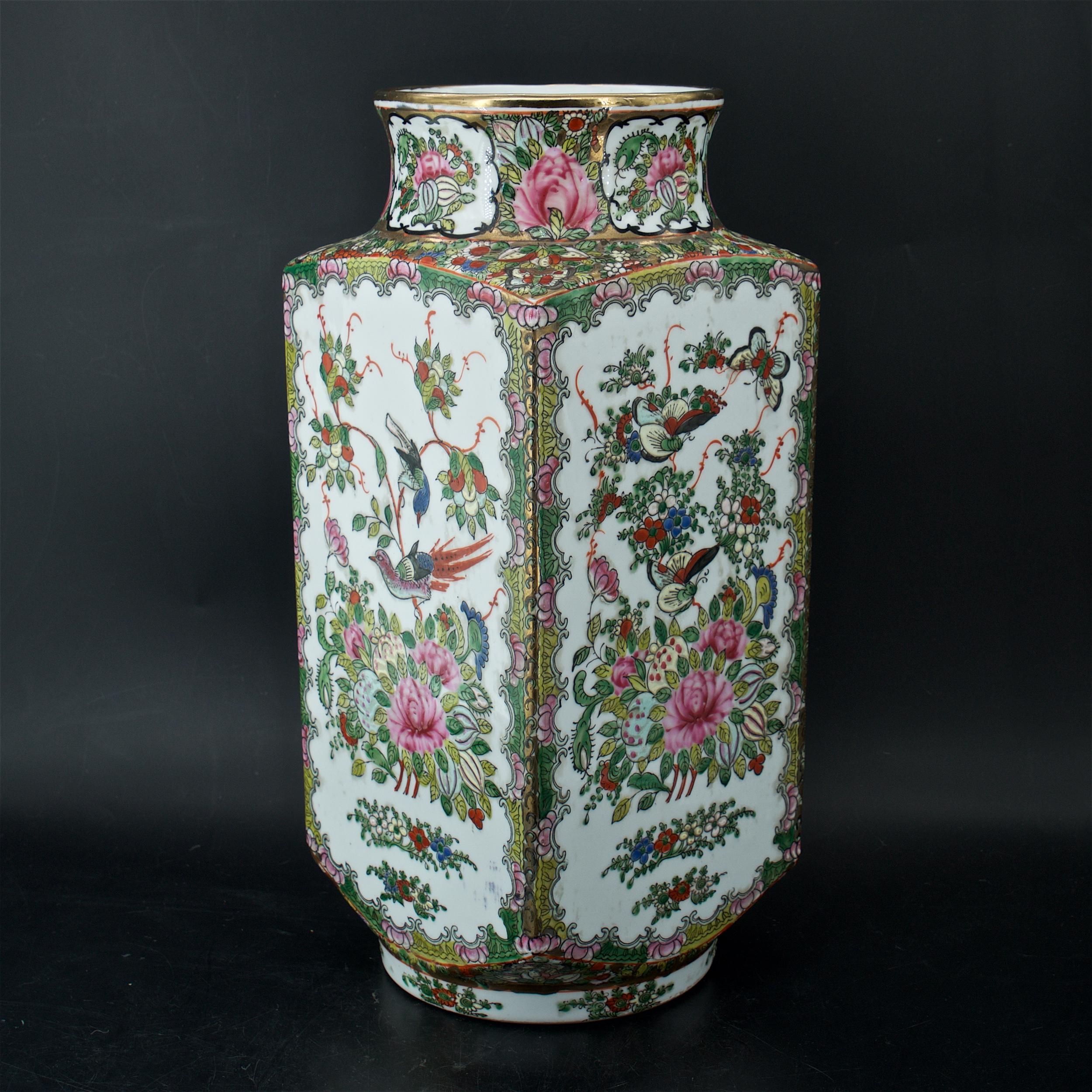 Gilt gold green in the negative spaces, then colorful scenes and borders all on white porcelain surface. An iron-red stamped, ground porcelain Rose Famille vase with Qianlong six-character seal mark, mid-20th century Macao/Macau production. This is