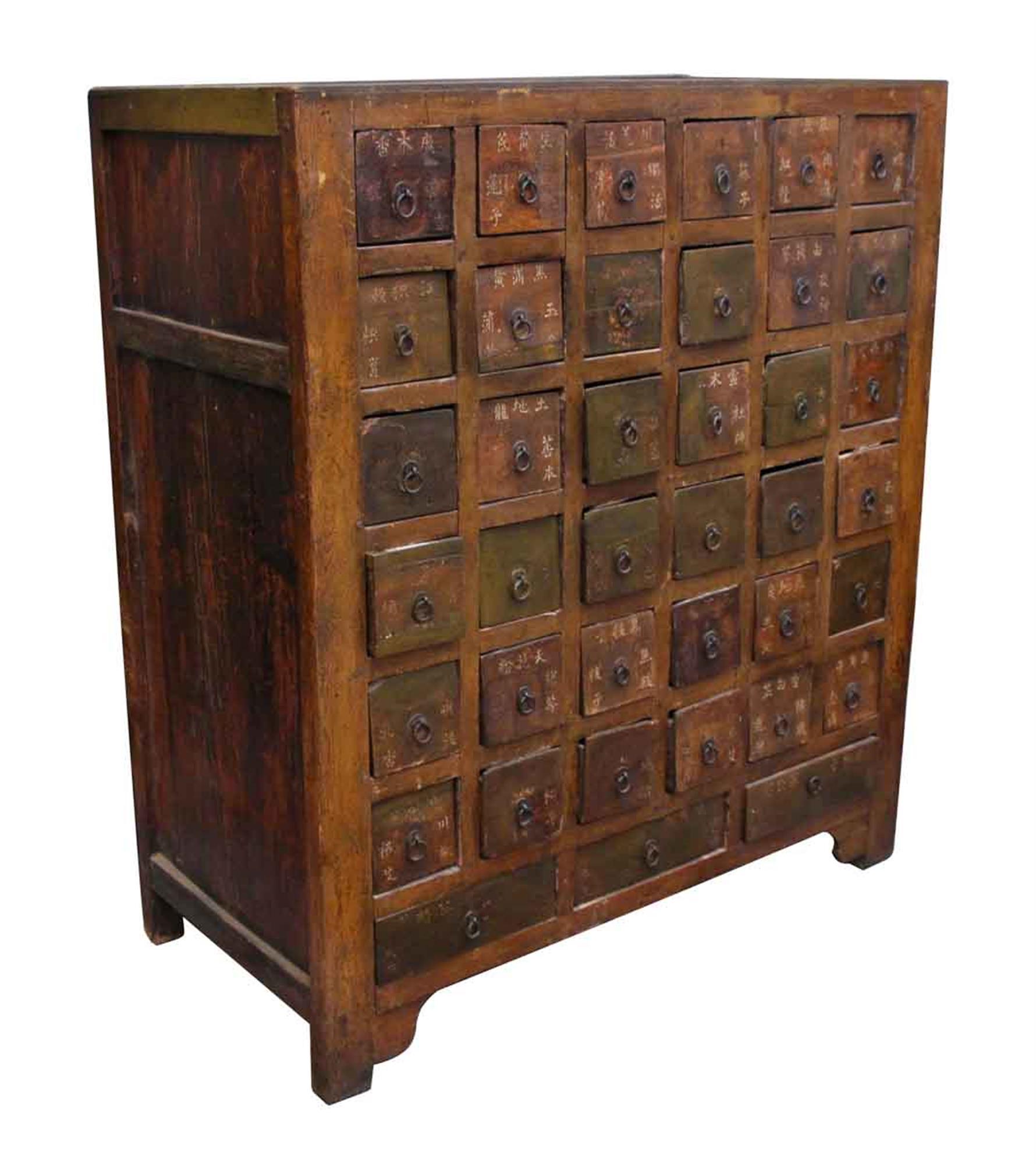 Truly an amazing piece, this cabinet was once used for herbs and other medicinal uses in Chinese medicine. 36 drawers. The top and back needs repair. This can be seen at our 5 East 16th St location on Union Square in Manhattan.