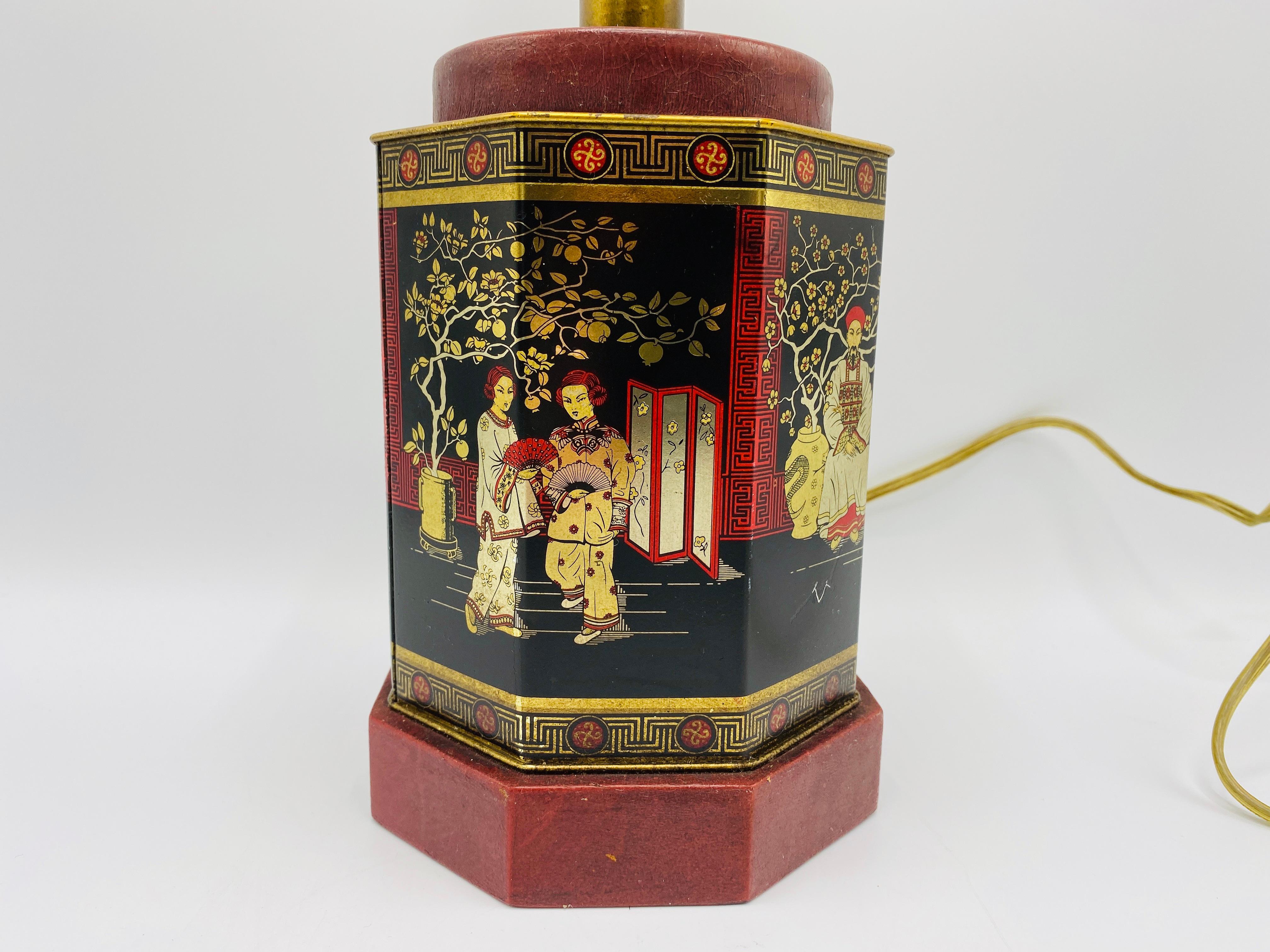 Painted 1950s Chinoiserie Red and Black Tole Tea Canister Lamp with Leather Details For Sale