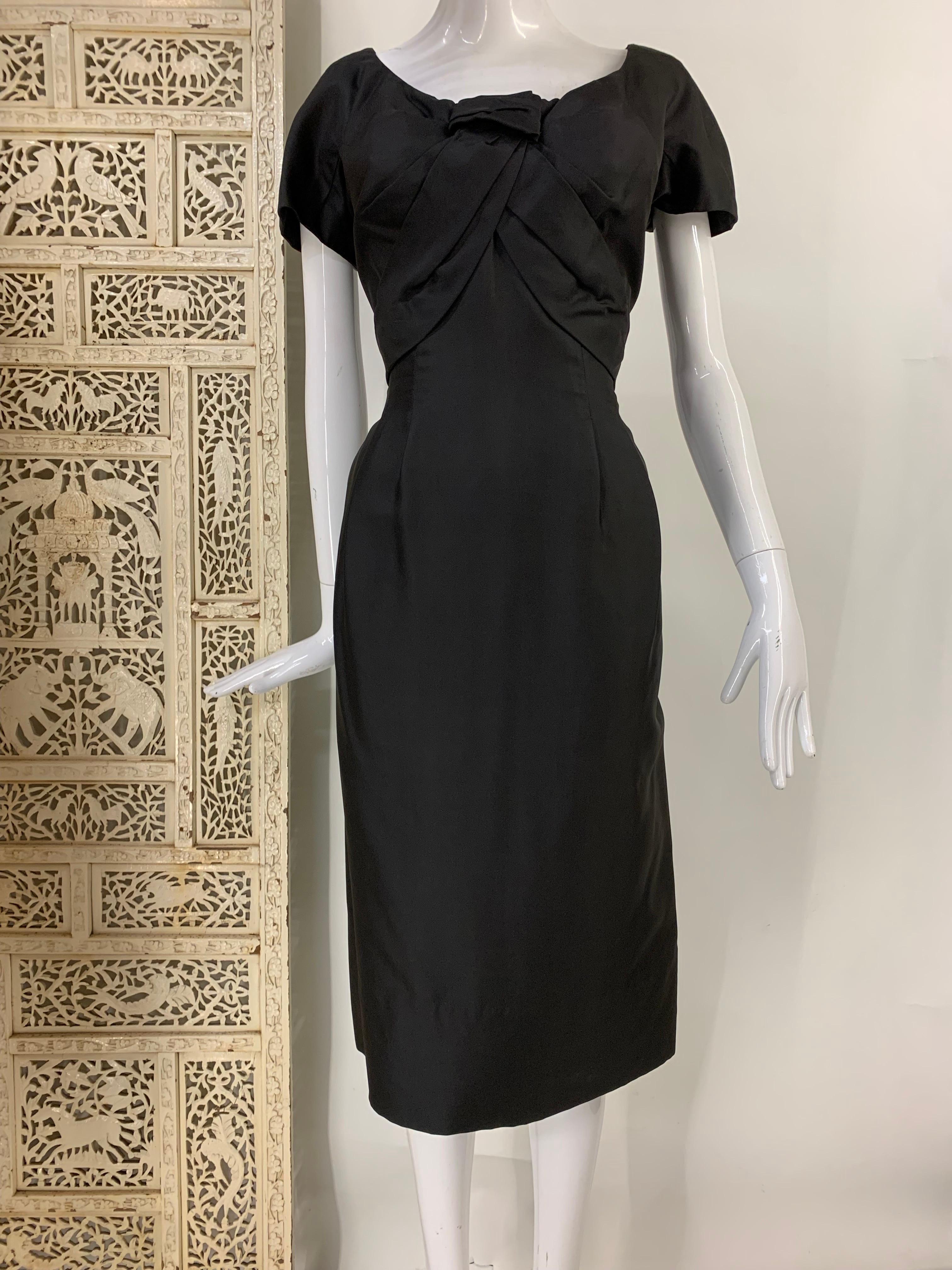1950s Christian Dior Little Black Sheath Dress w Tucked Bustline and Fitted Waist: Matte black silk faille in a medium weight. Back kick pleat. Back zipper. Fully lined in silk organza. Lots of beautifully done hand work on this Dior Classic. Modern