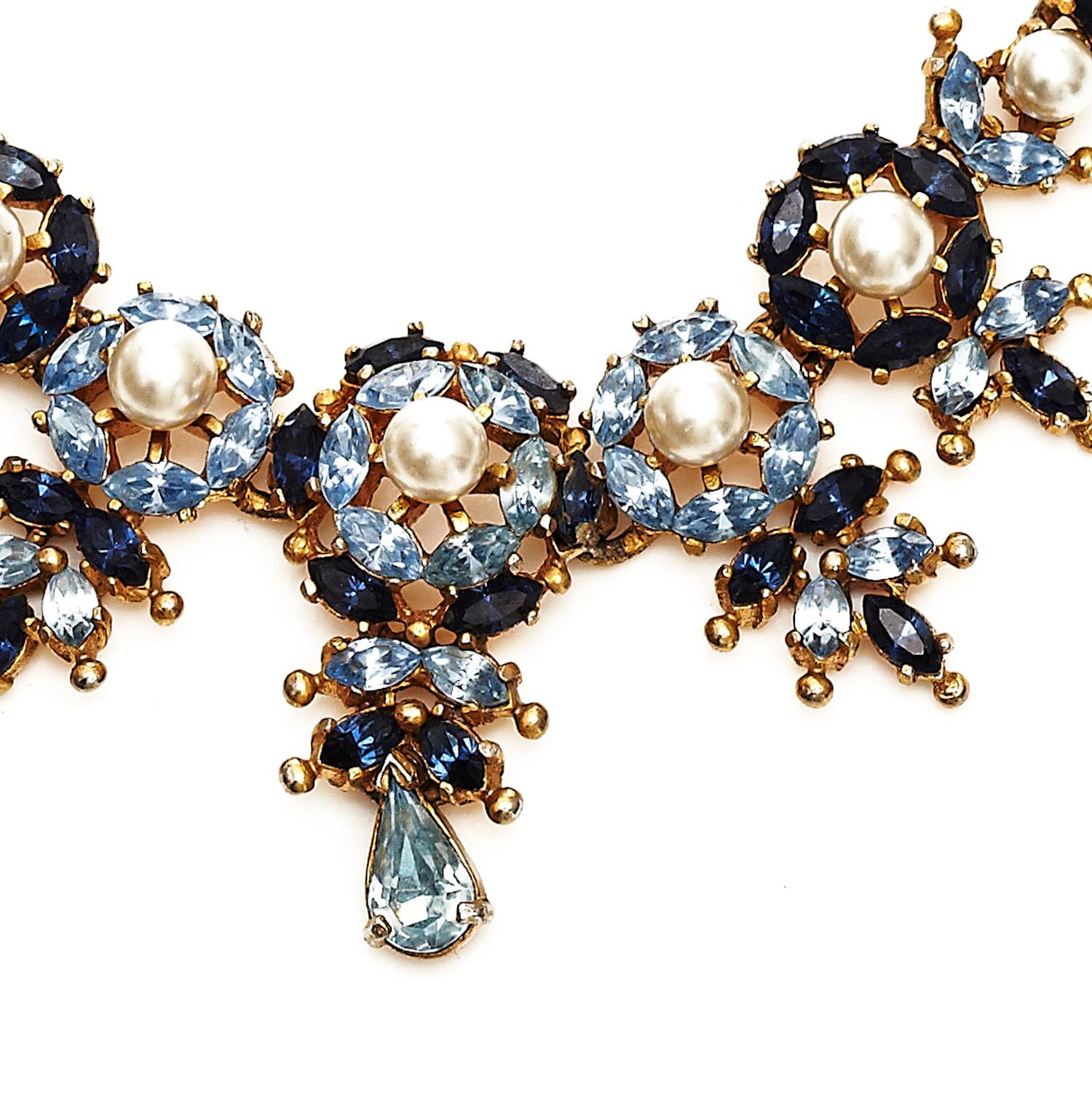 A classic 1950’s necklace by Mitchel Maer for Christian Dior. The pearls, faux sapphire and turquoise stones combination is a style that's quintessentially 1950’s and resembles fine jewellery. It's signed in the usual place for Maer pieces on an