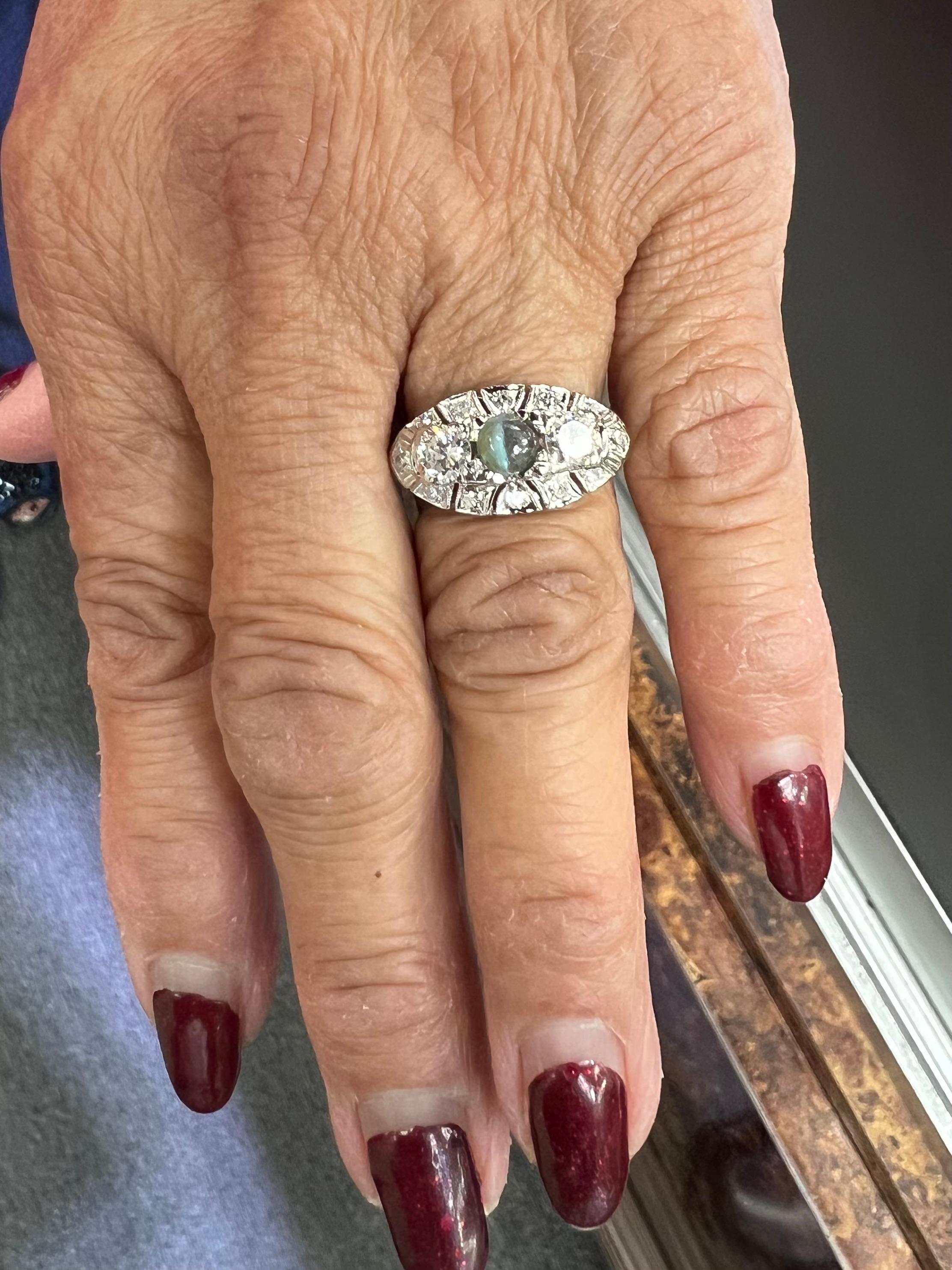 1950s Chrysoberyl Catseye Diamond Platinum Engagement Ring.

The 1950s Chrysoberyl Catseye Diamond Platinum Engagement Ring represents a significant intersection of gemstone allure and mid-20th-century aesthetics. Chrysoberyl, particularly in its