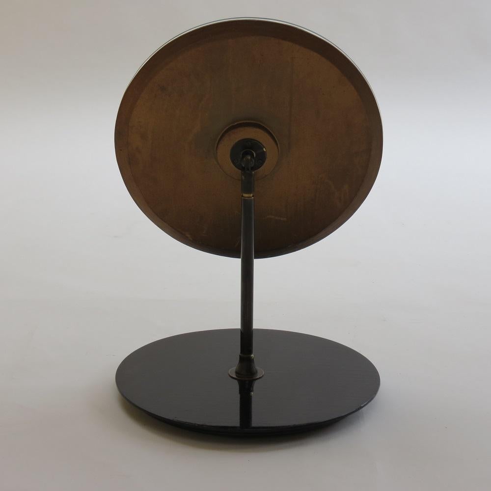 Mid-Century Modern 1950s Circular Hat Shop Adjustable Mirror on Black Ebonized Stand For Sale