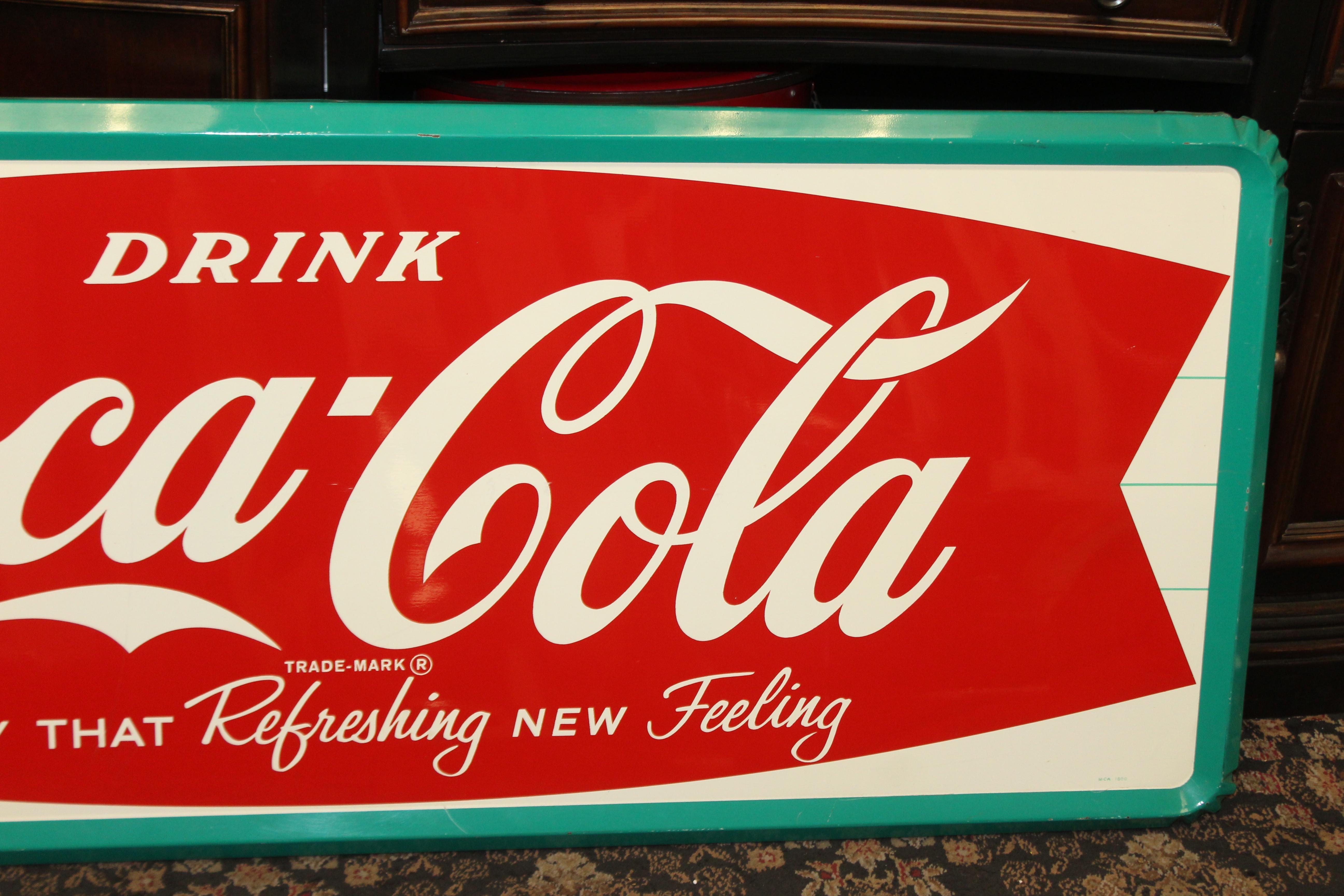 coca cola fishtail sign