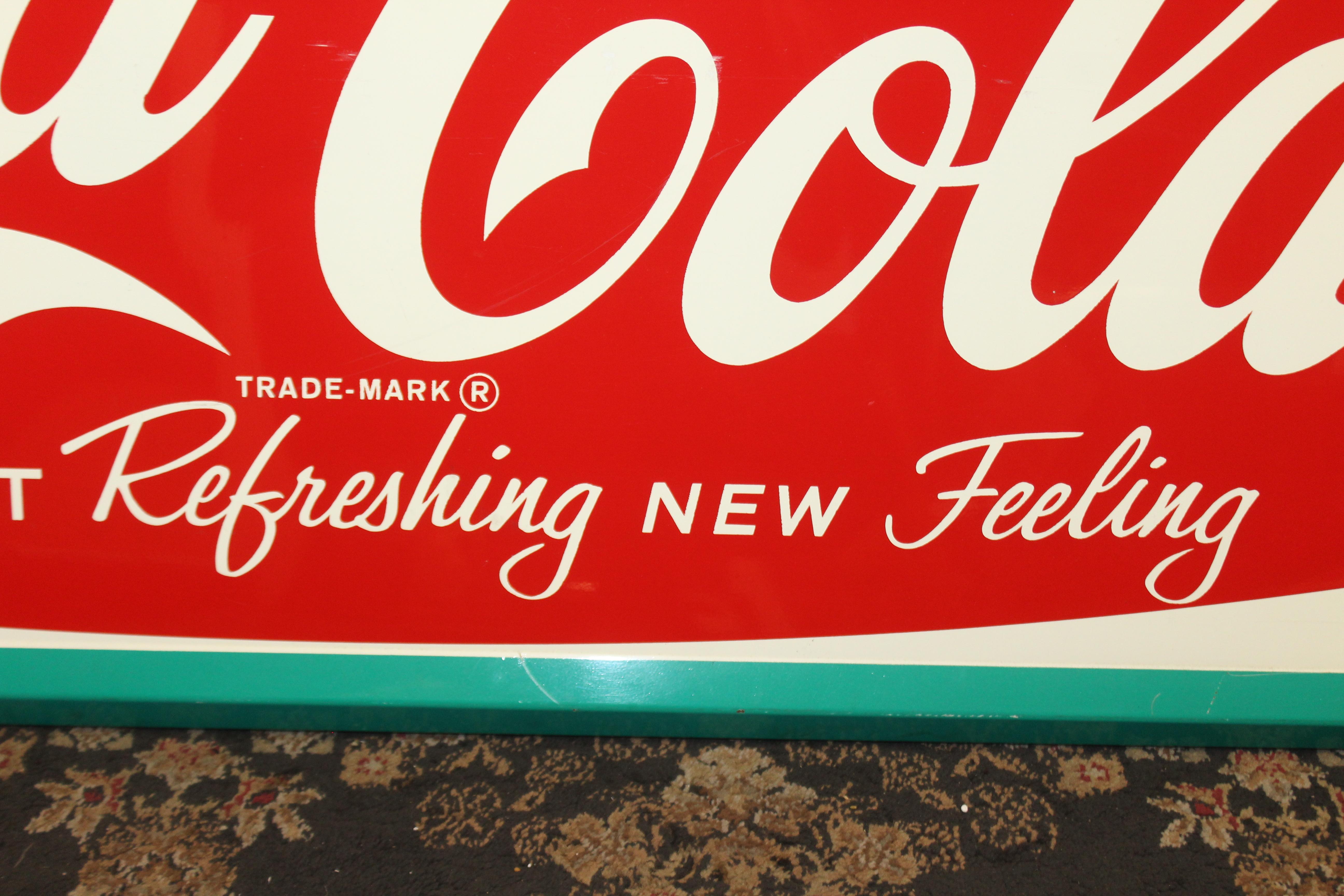 enjoy coca cola sign