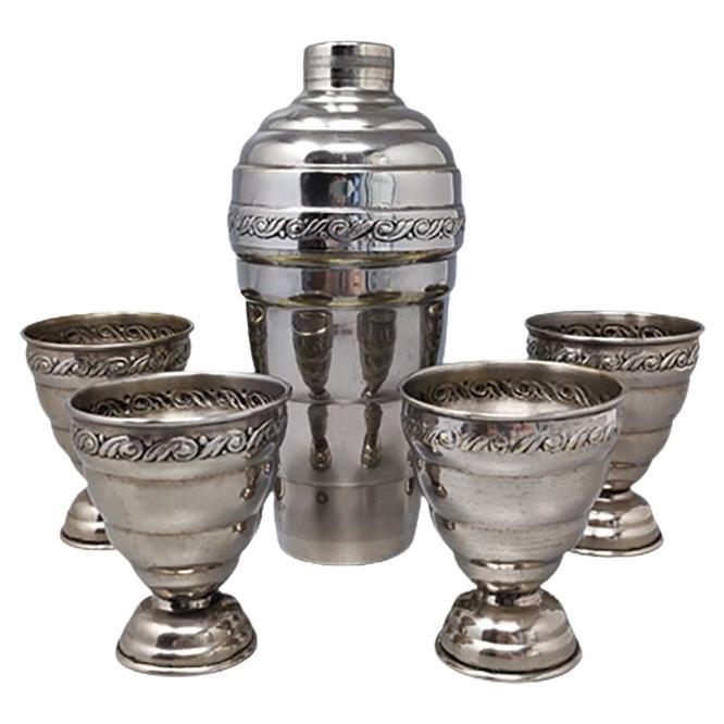 1950s Cocktail Shaker Set with Four Glasses in Stainless Steel.  For Sale