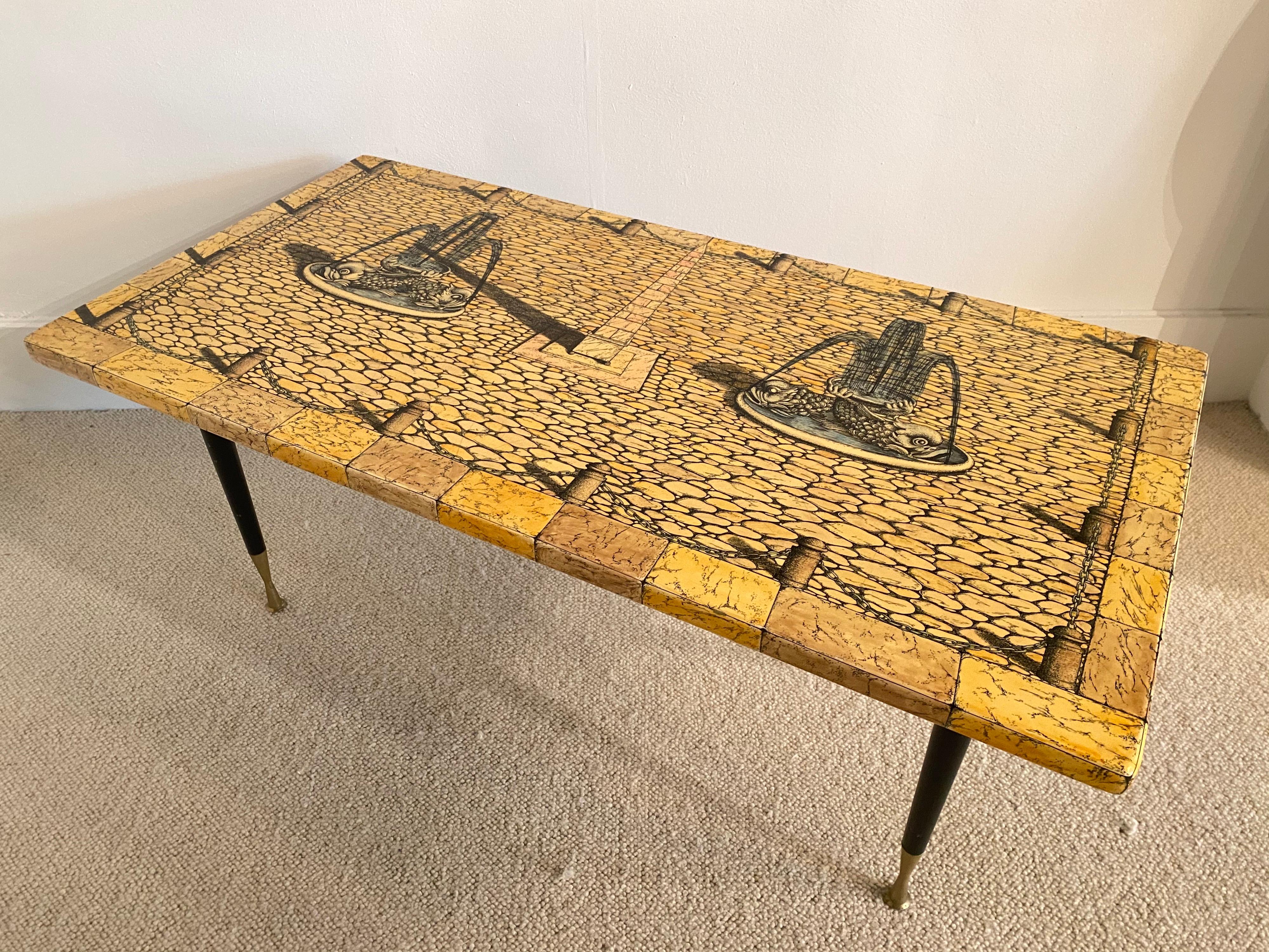1950s coffee table by Piero Fornasetti
Black lacquered metal and brass feets
Stamped by Fornasetti
Great vintage condition.
