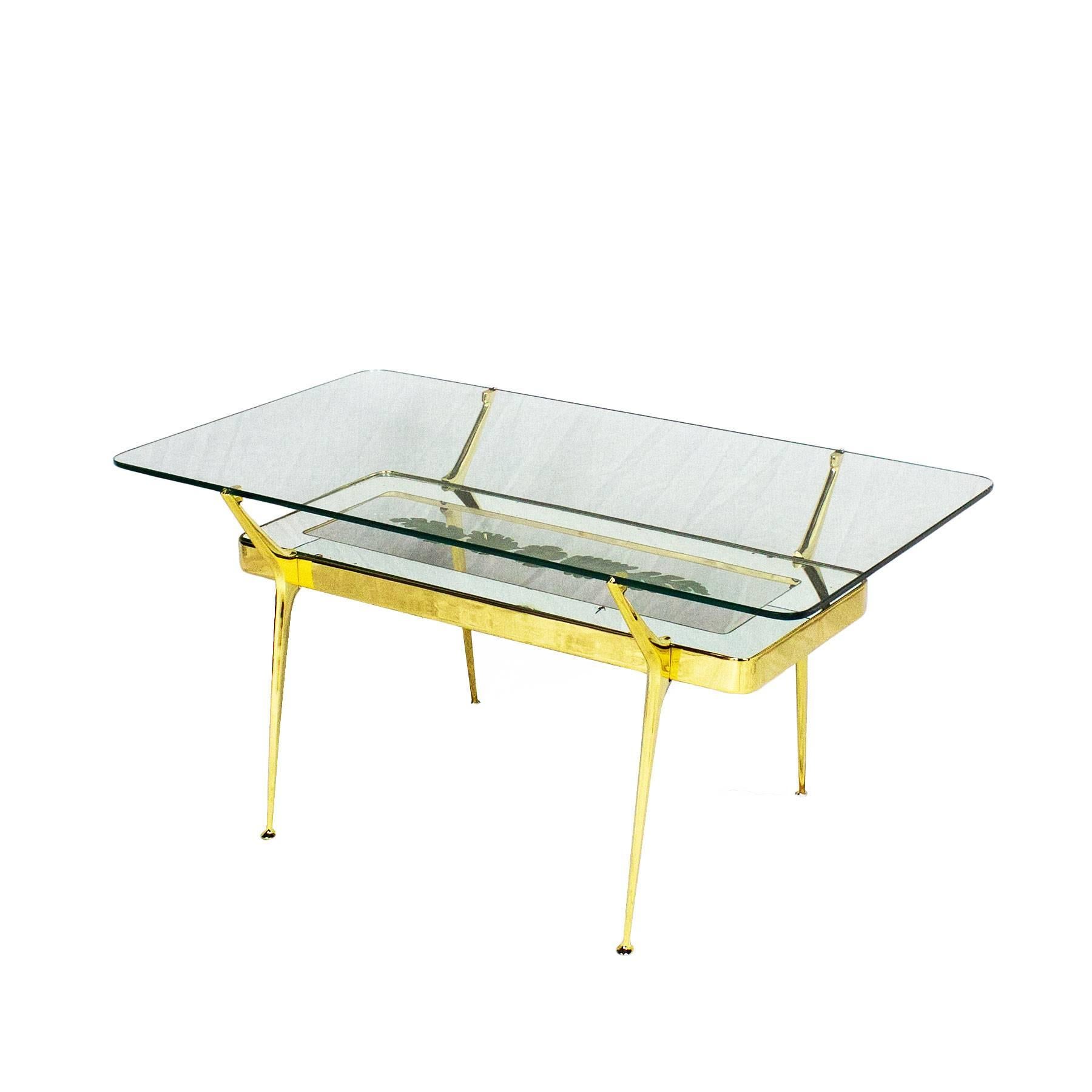 Coffee table, solid and polished brass structure, mirrored (oxidation and losses) and etched glass with flowers decoration. Thick original glass on top.

Design: Cesare Lacca

Italy, circa 1950.