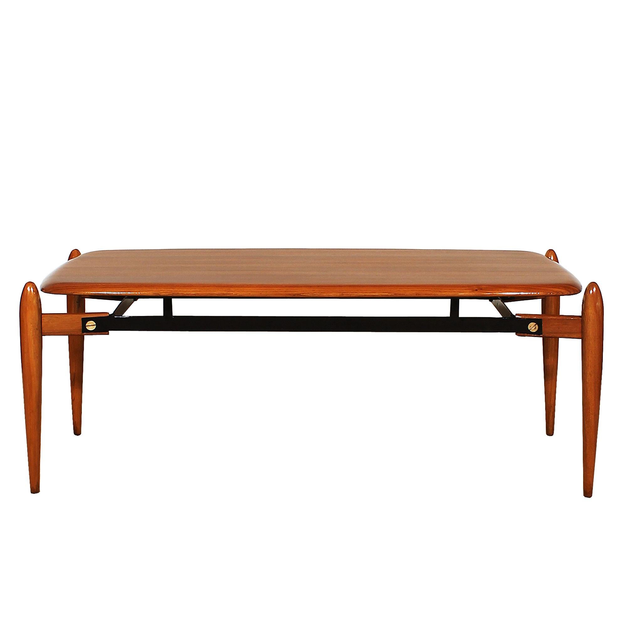 Coffee table in solid teak with ebony strips, french polish, black iron structure with brass hardware.

Italy circa 1950