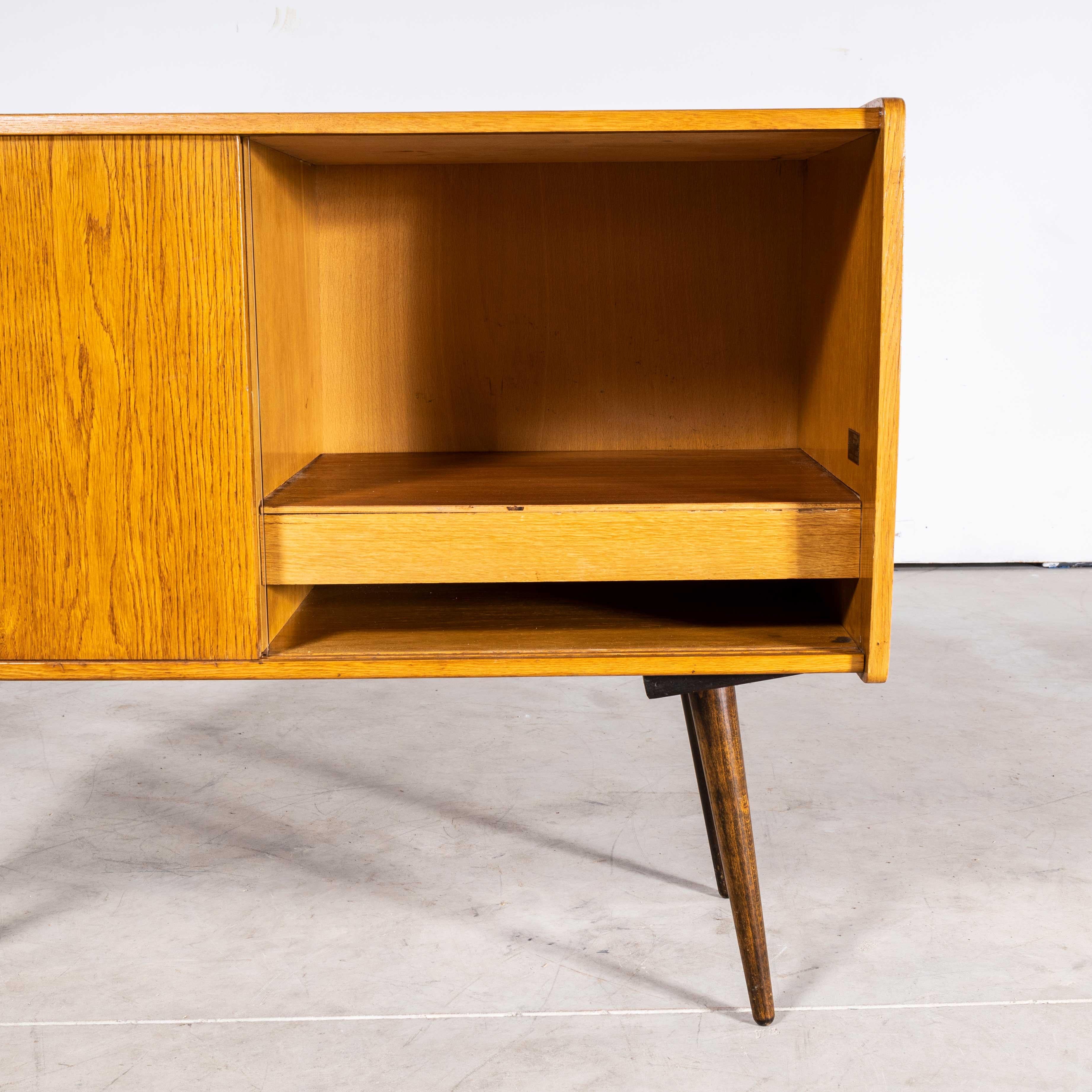 1950s Compact Sideboard – Original Media Unit – Nabytek Czech
1950s Compact Sideboard – Original Media Unit – Nabytek Czech. Beautiful simple and Classic midcentury small sideboard – media unit sourced in the Czech Republic. Produced by Nabytek in