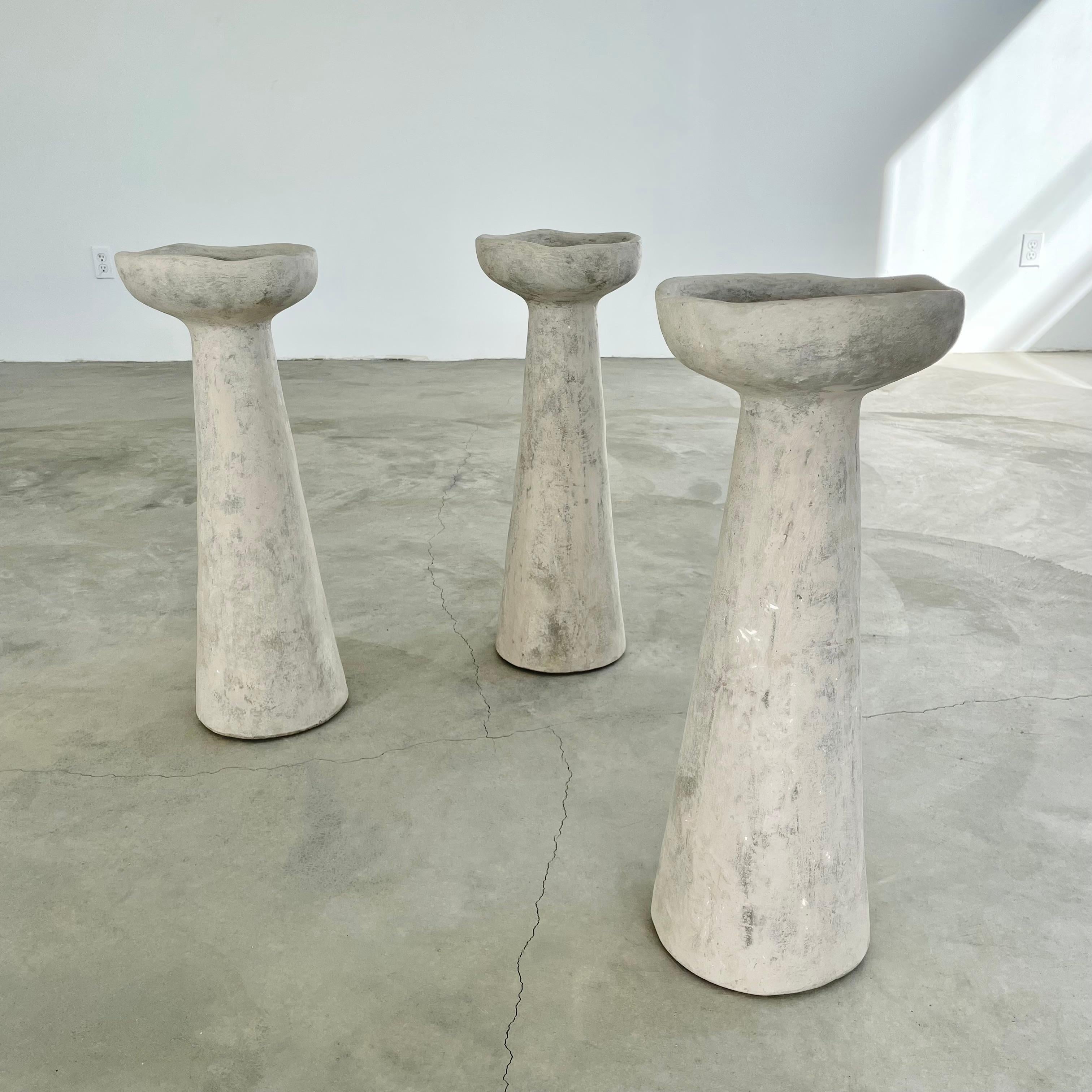 Vintage plaster/concrete bird baths in the style of Willy Guhl. Great shape and form. Good vintage condition. Three available, priced individually.