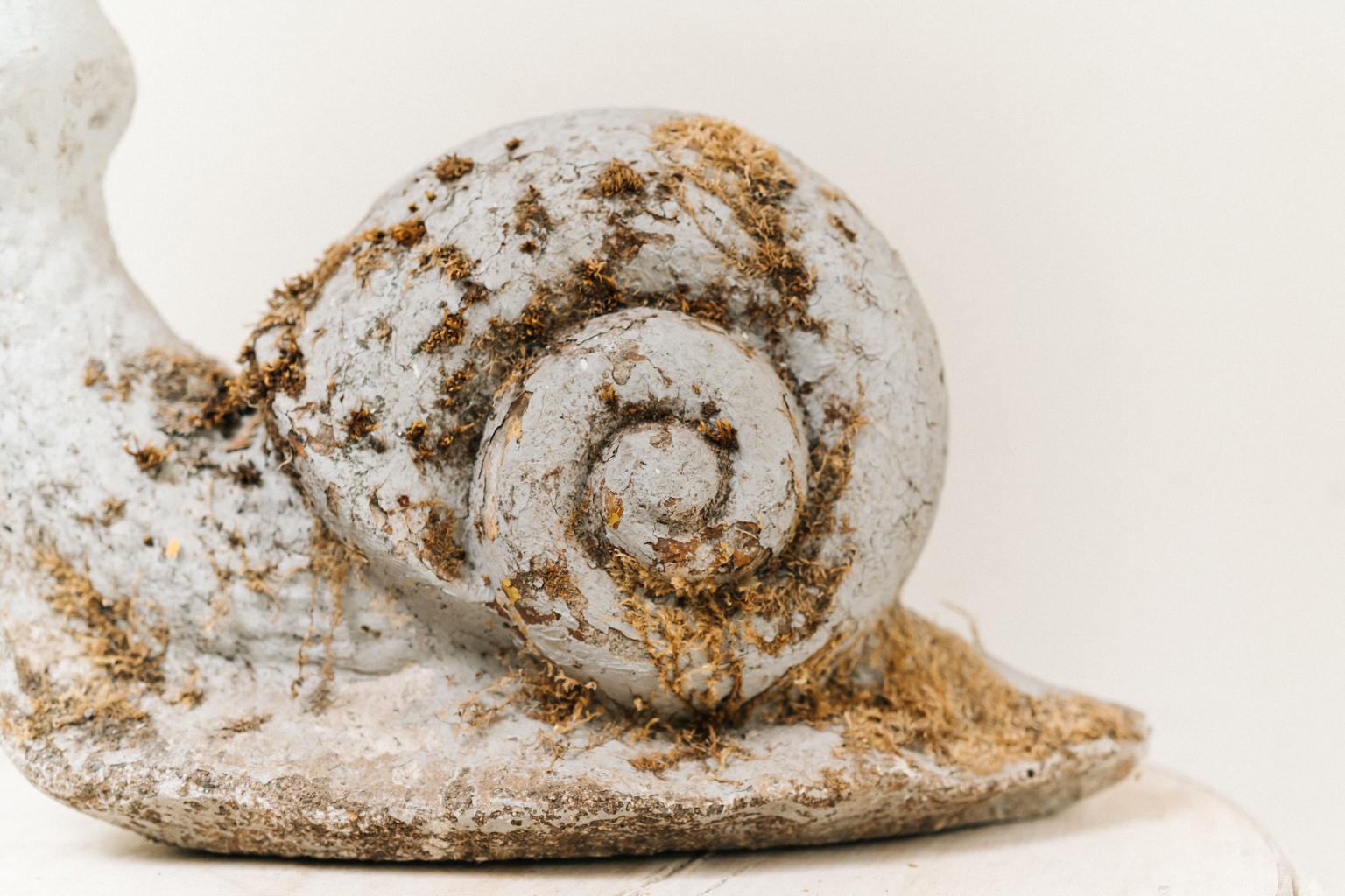 concrete snail statue