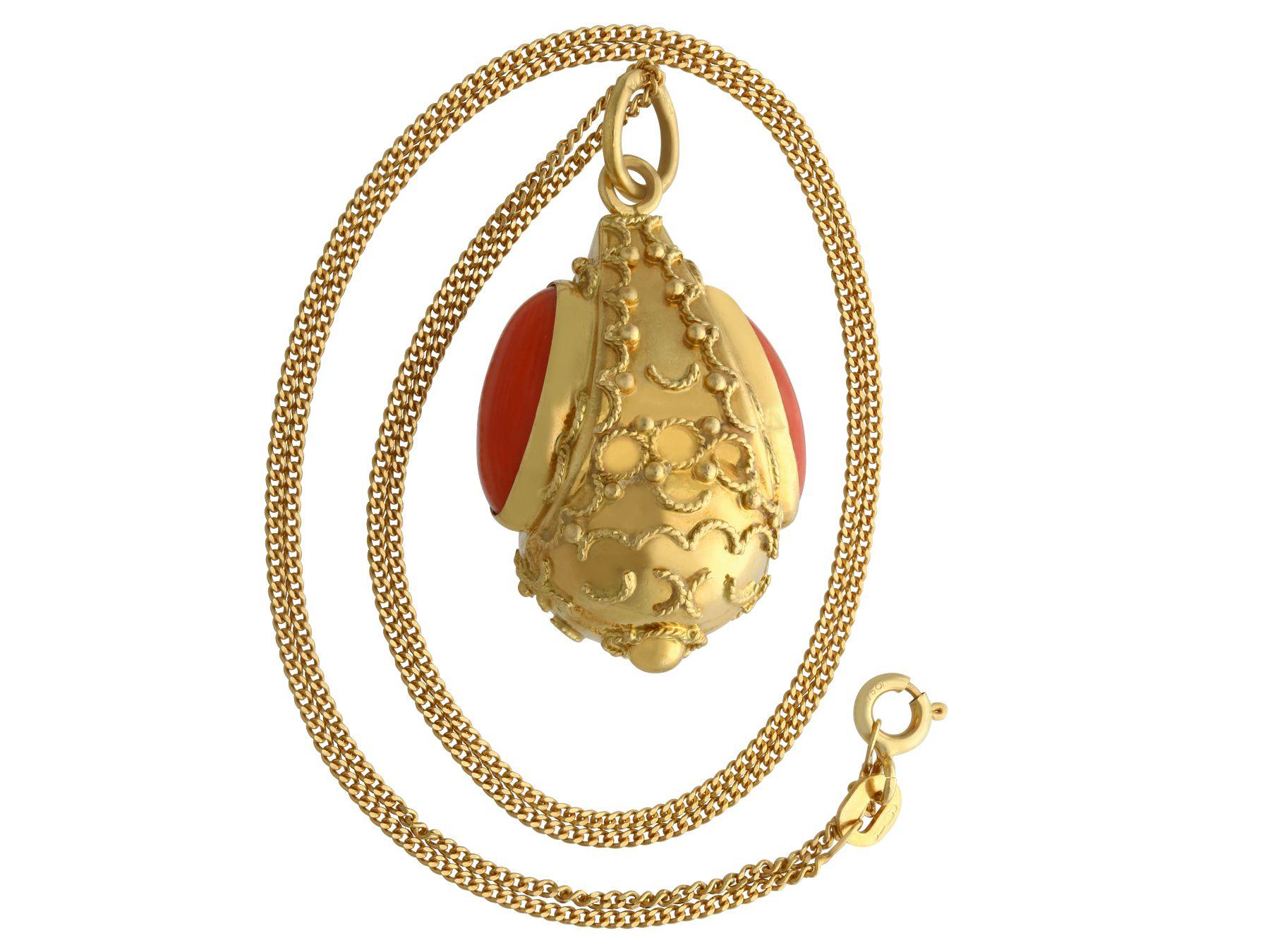 An impressive vintage 1950s coral and 18 karat yellow gold pendant; part of our diverse vintage jewelry and estate jewelry collections.

This fine and impressive coral and gold pendant has been crafted in 18k yellow gold.

The three dimensional,