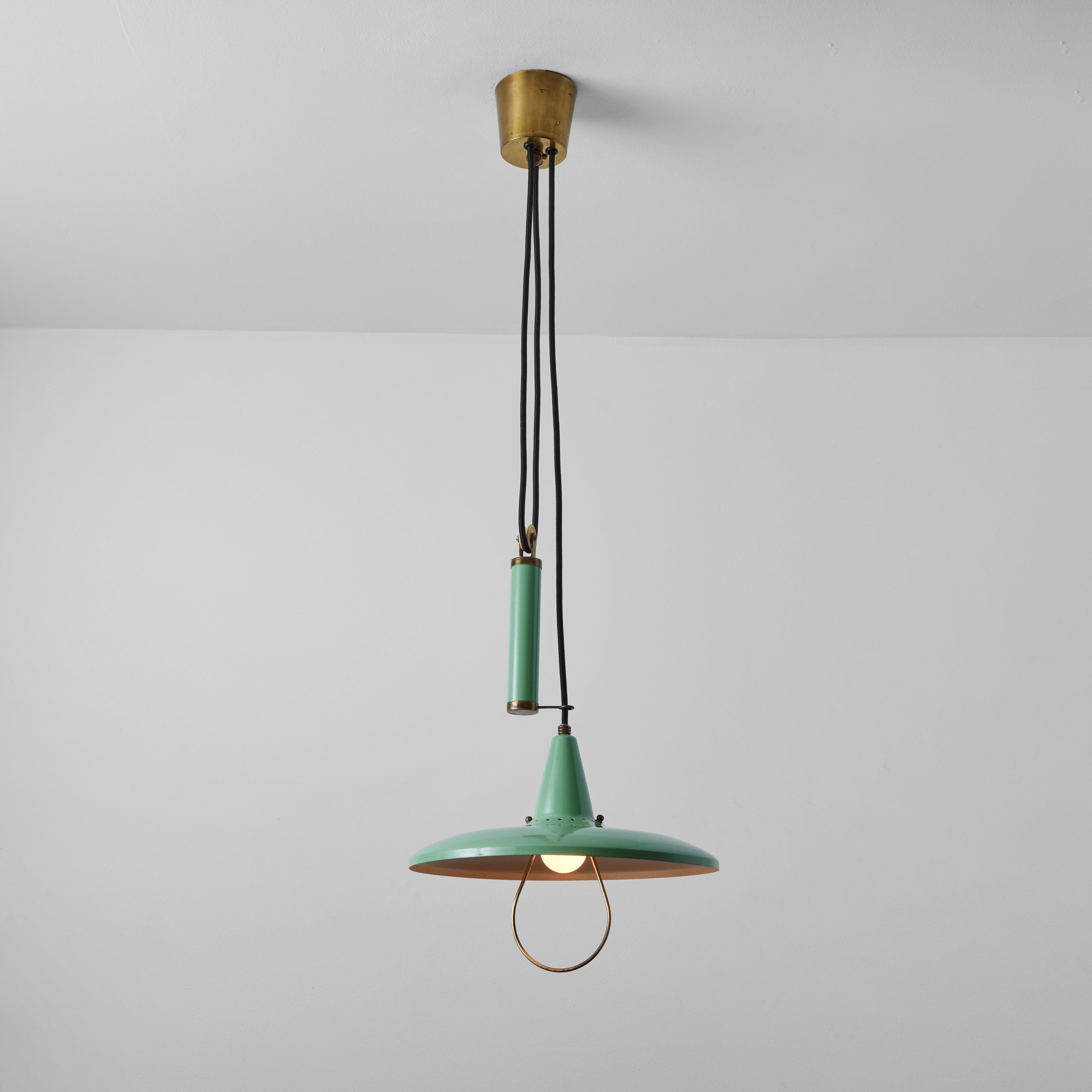 1950s Counter-weight pendant attributed to Gaetano Sciolari for Stilnovo. A quintessentially 1950s Italian design executed in green painted metal and brass. Height can be adjusted by raising or lowering the counter weight. A highly functional and