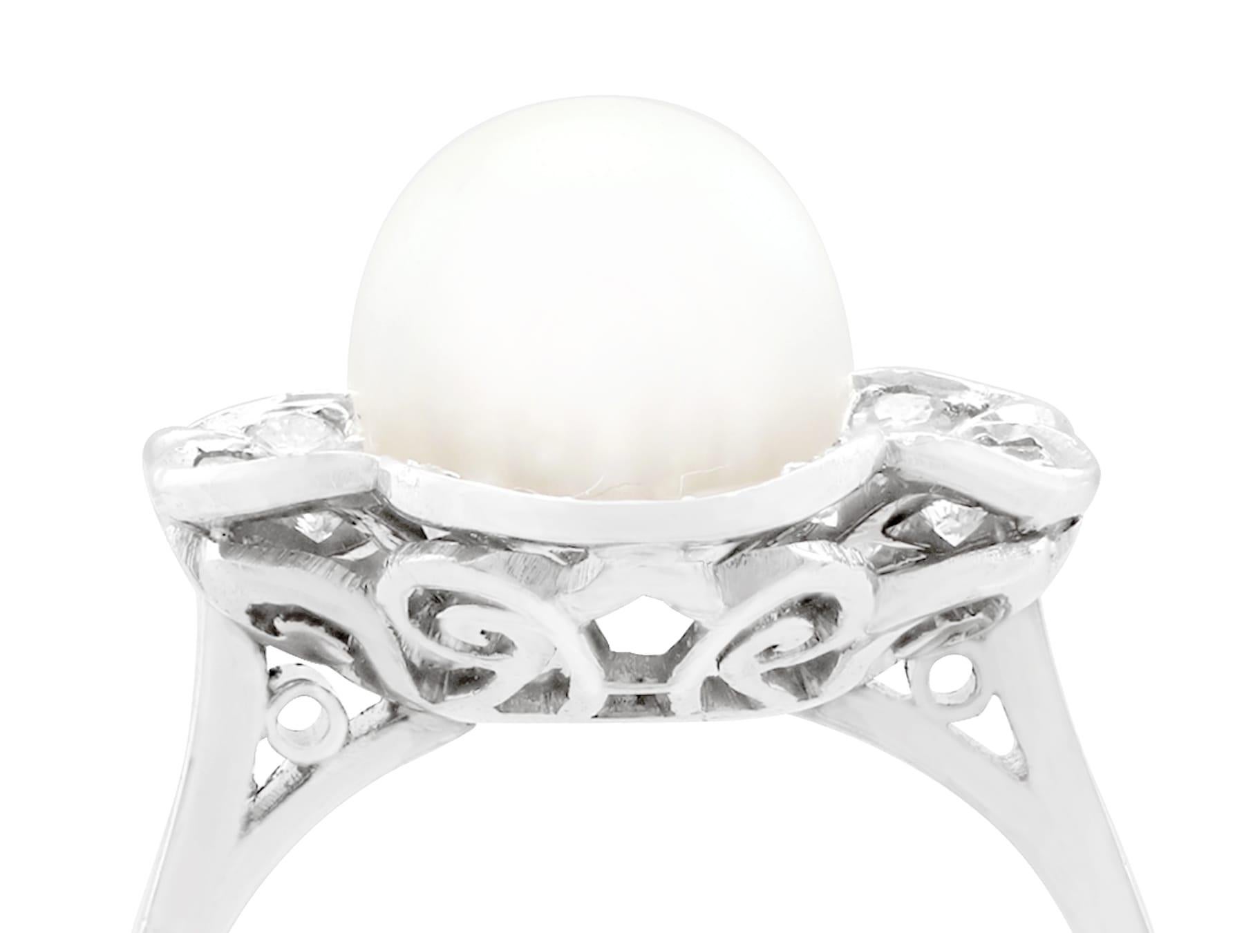 An impressive vintage cultured pearl and 1.02 carat diamond, platinum cluster style cocktail ring; part of our diverse vintage jewelry and estate jewelry collections.

This fine and impressive cultured pearl and diamond ring has been crafted in