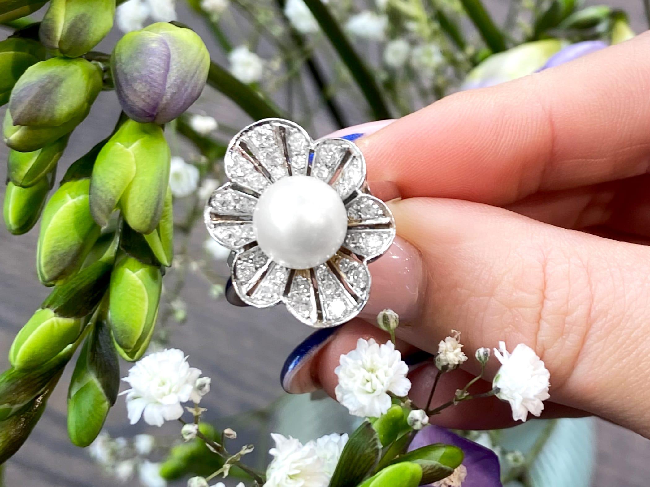 An impressive vintage cultured pearl and 1.02 carat diamond, platinum cluster style cocktail ring; part of our diverse vintage jewelry and estate jewelry collections.

This fine and impressive cultured pearl and diamond ring has been crafted in