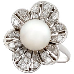 1950s Cultured Pearl and 1.02 Carat Diamond Platinum Cluster Ring