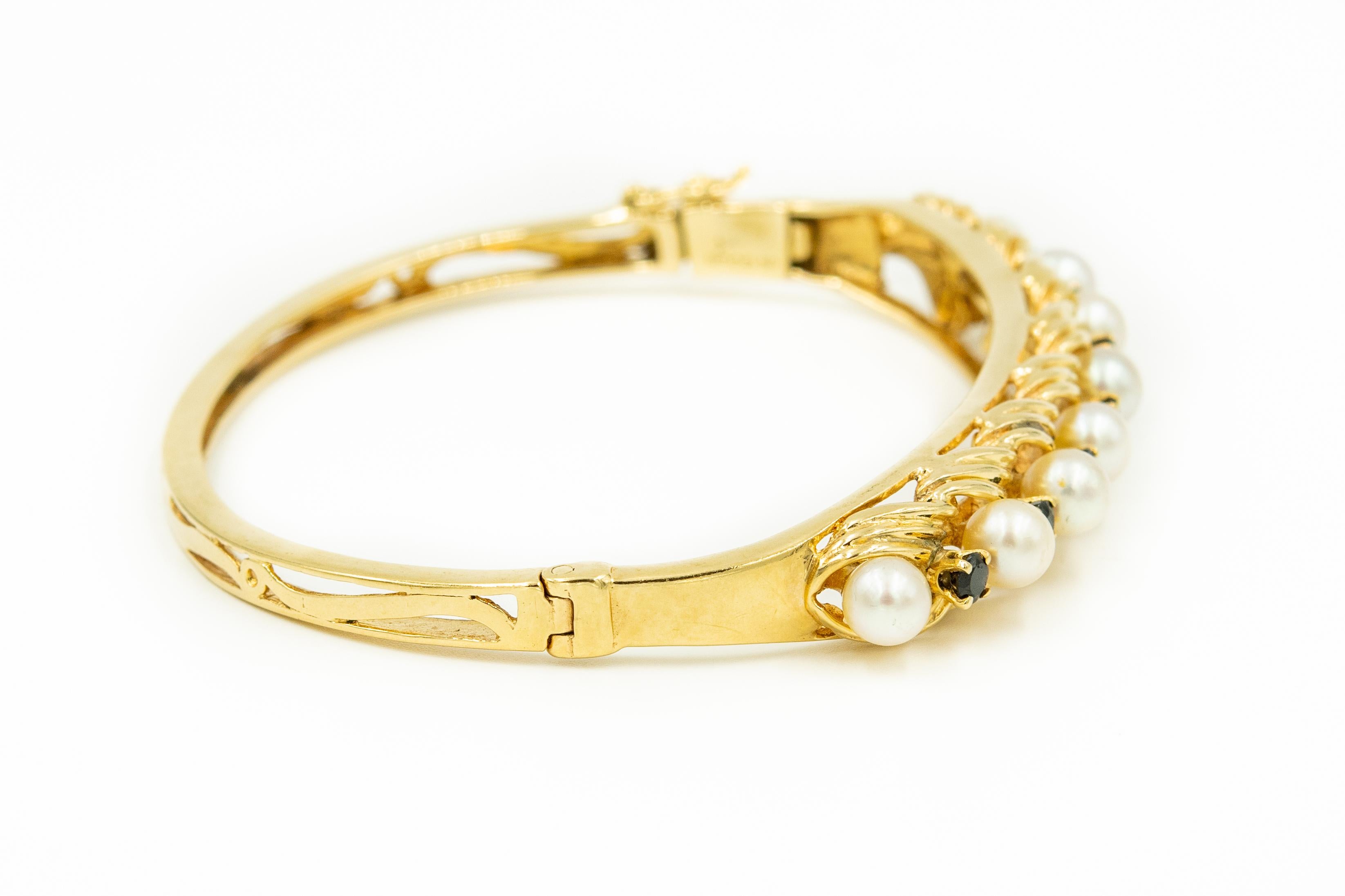 gold bangle with pearls