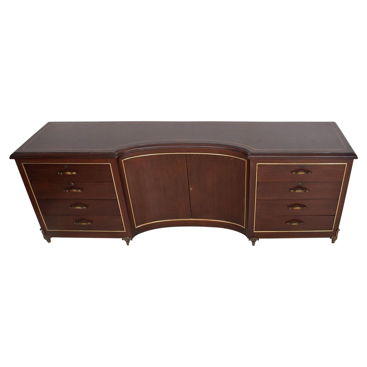 Modern Credenza Dresser Mahogany & Bronze by Arturo Pani Mexico circa 1950s.
No markings or signature from the maker.
Magnificent design curved center angled doors with pull-out drawers at each side.
Drawers constructed with double dove tail