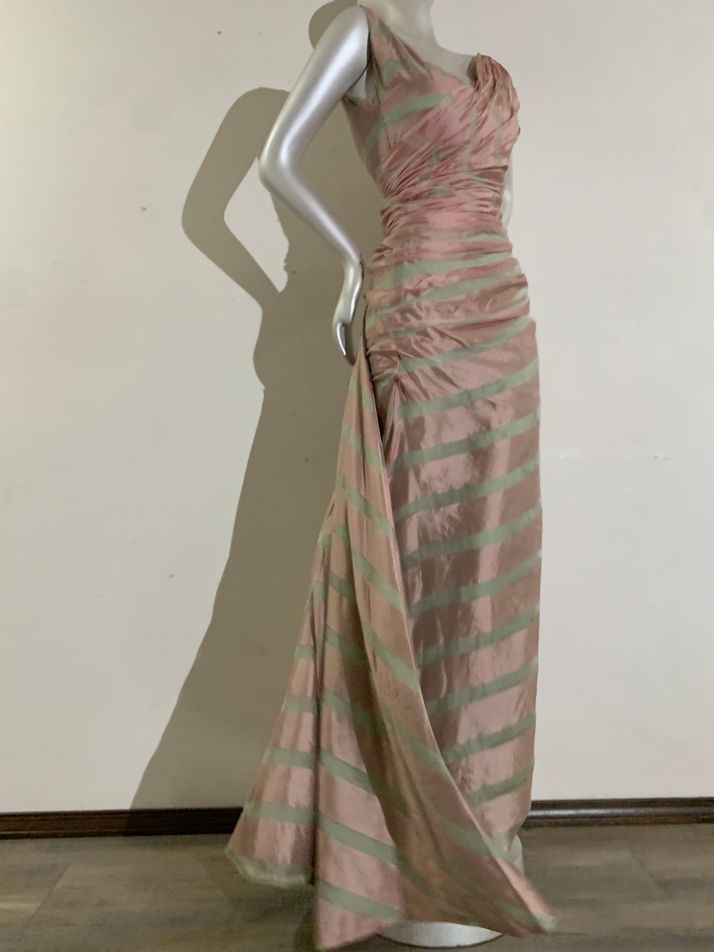 1950s Custom-Made Pink & Celadon Striped Silk Organza Evening Gown w Bias Gathering & Fishtail Streamer Train: Sheer awning stripe organza is gathered at waist and all cut on the bias. Fully lined in celadon green silk. Side zipper. Extra-long train
