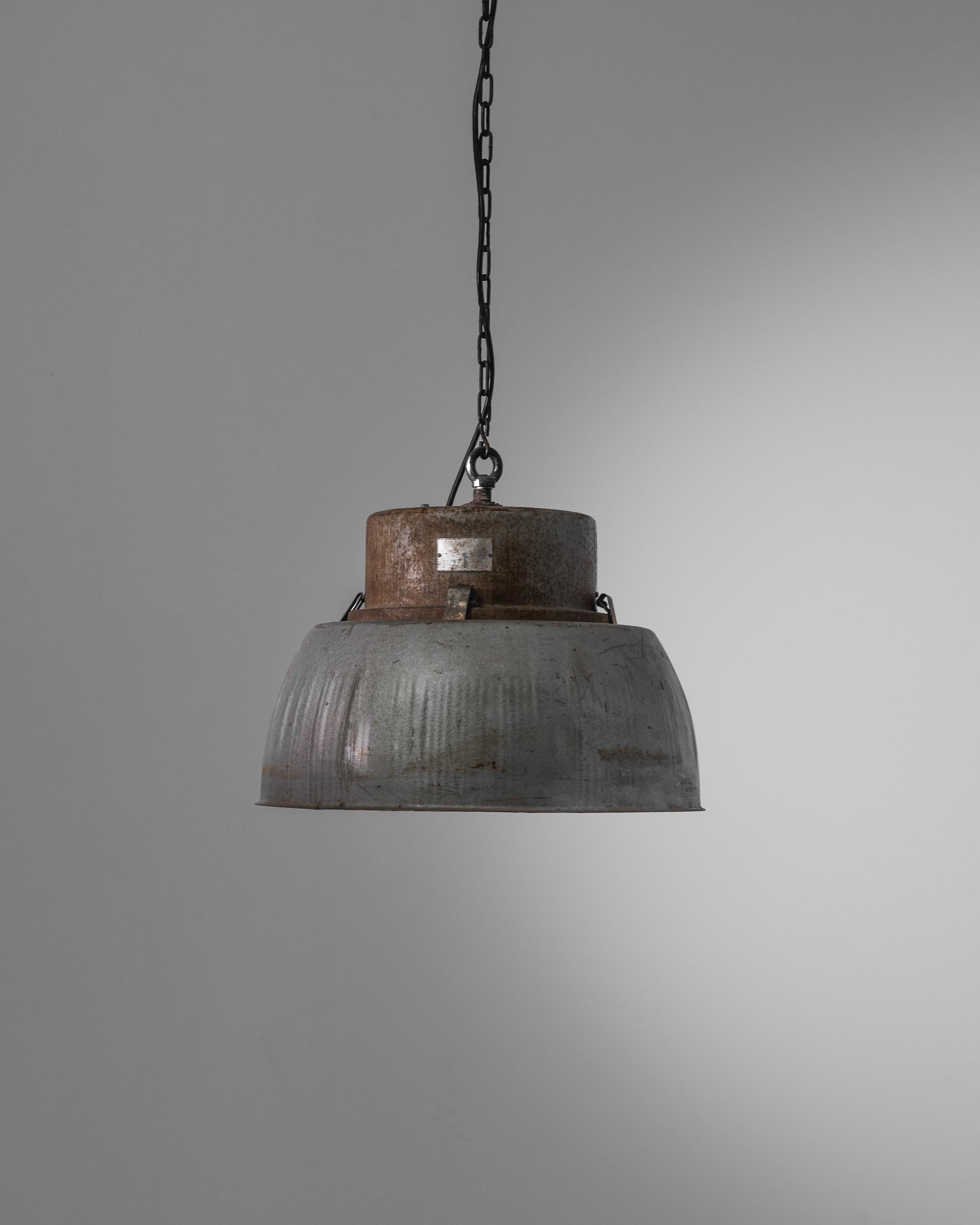 Bare essential lighting from the mid-20th century. Used in industry and lifted up by design champions like Le Corbusier. Originally designed to serve the purposes of industry, durable metal and robust construction also satisfy our desire for a