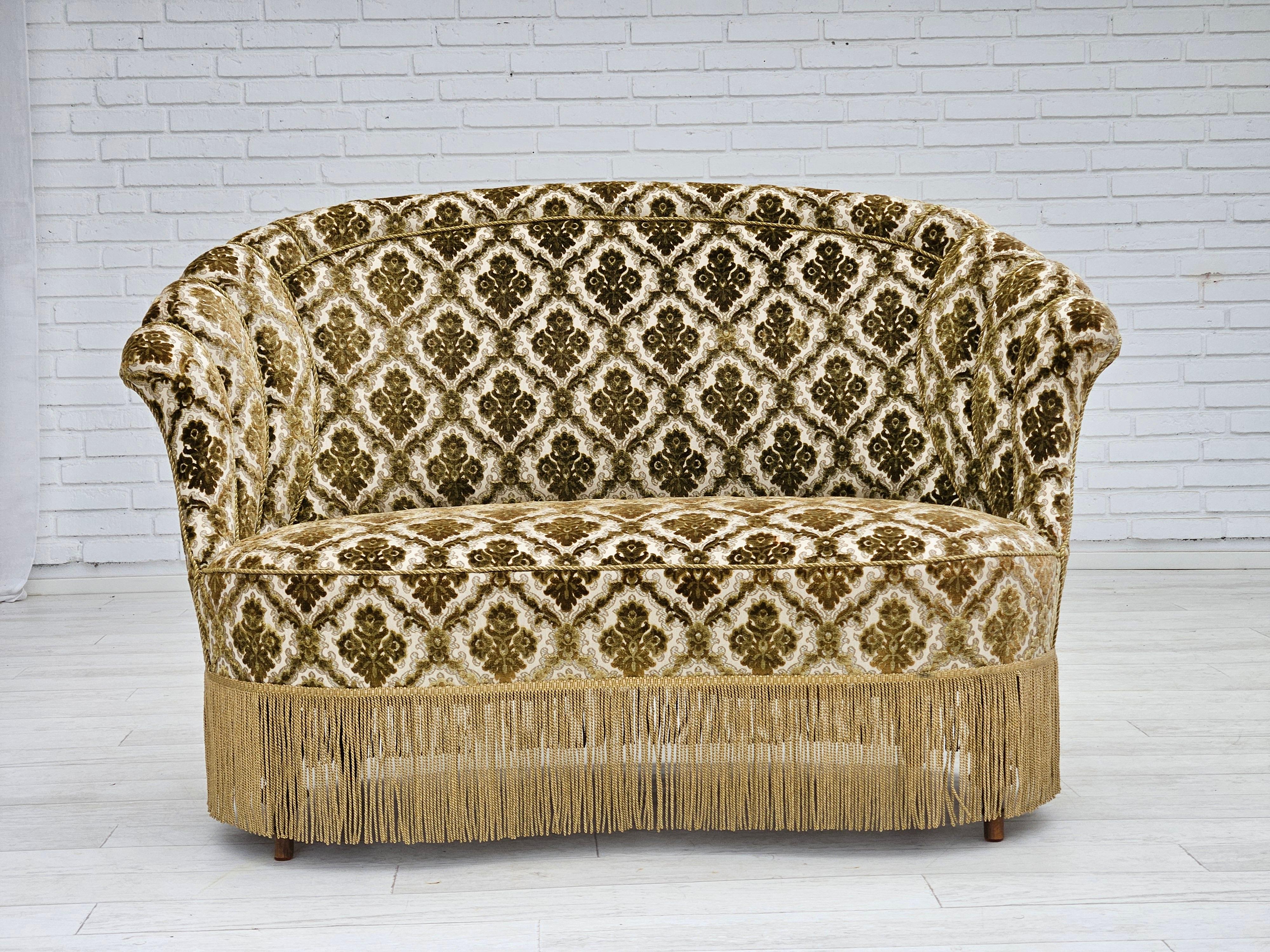 1950s, Danish 2-seater sofa. Sofa was reupholstered about 10 years ago by craftsman. Furniture velour, ash wood legs, springs in the seat. Very good condition: no smells, no stains, and stable construction. Manufactured by Danish furniture maker in