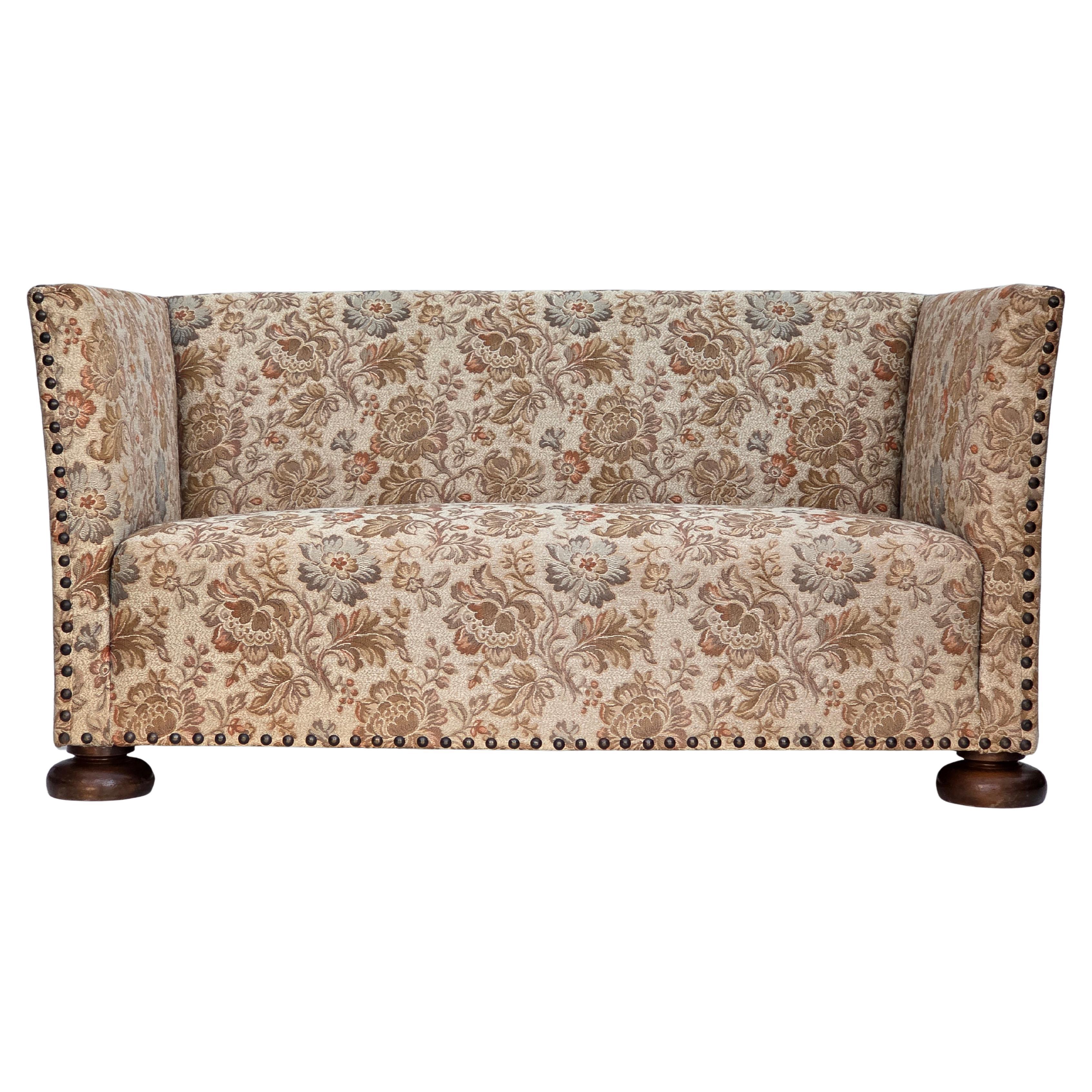 1950s, Danish 2-seater sofa, beige/ brown furniture fabric, oak wood. For Sale