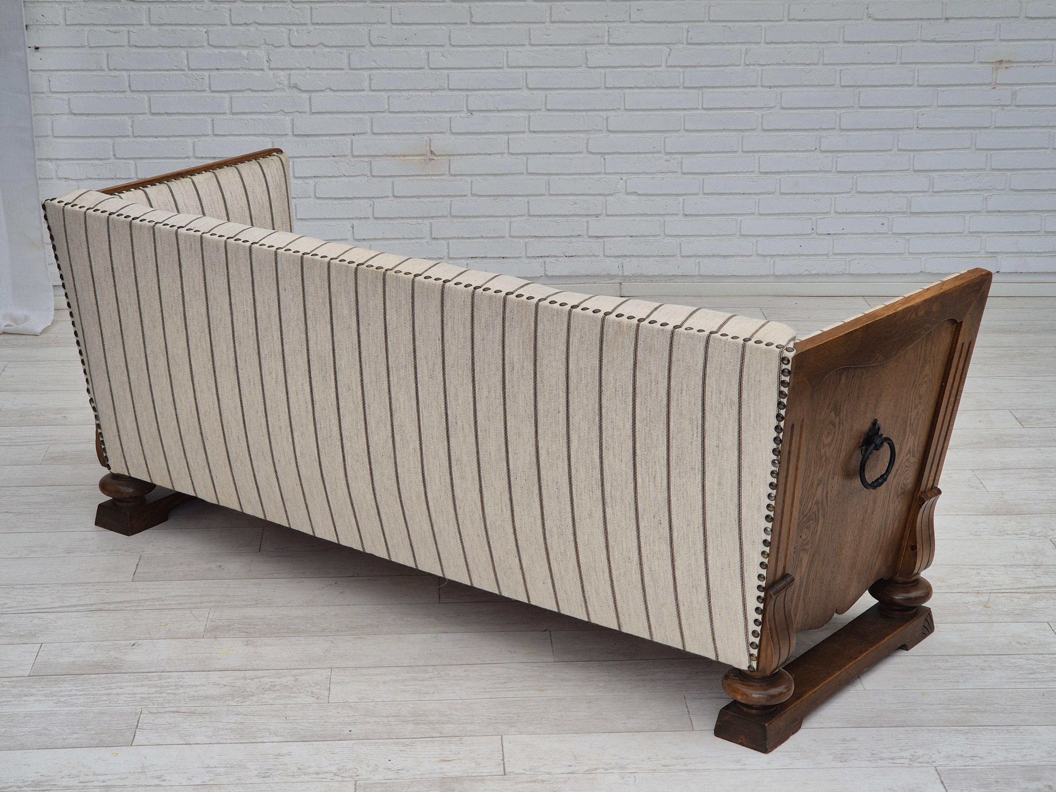 Mid-20th Century 1950s, Danish 2 seater sofa in quality furniture wool, oak wood. For Sale