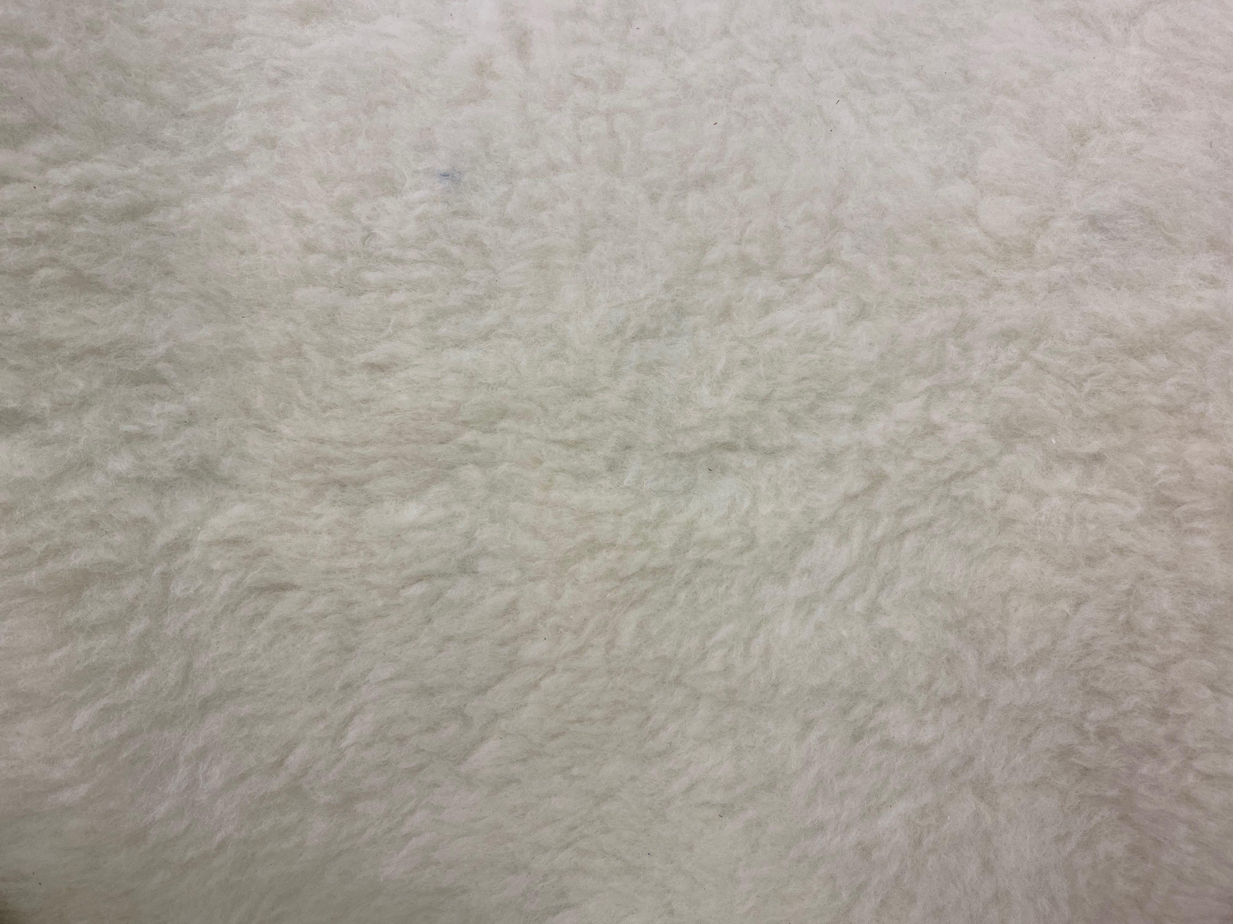 Sillón danés de los años 50 en lana de cordero Danés en venta