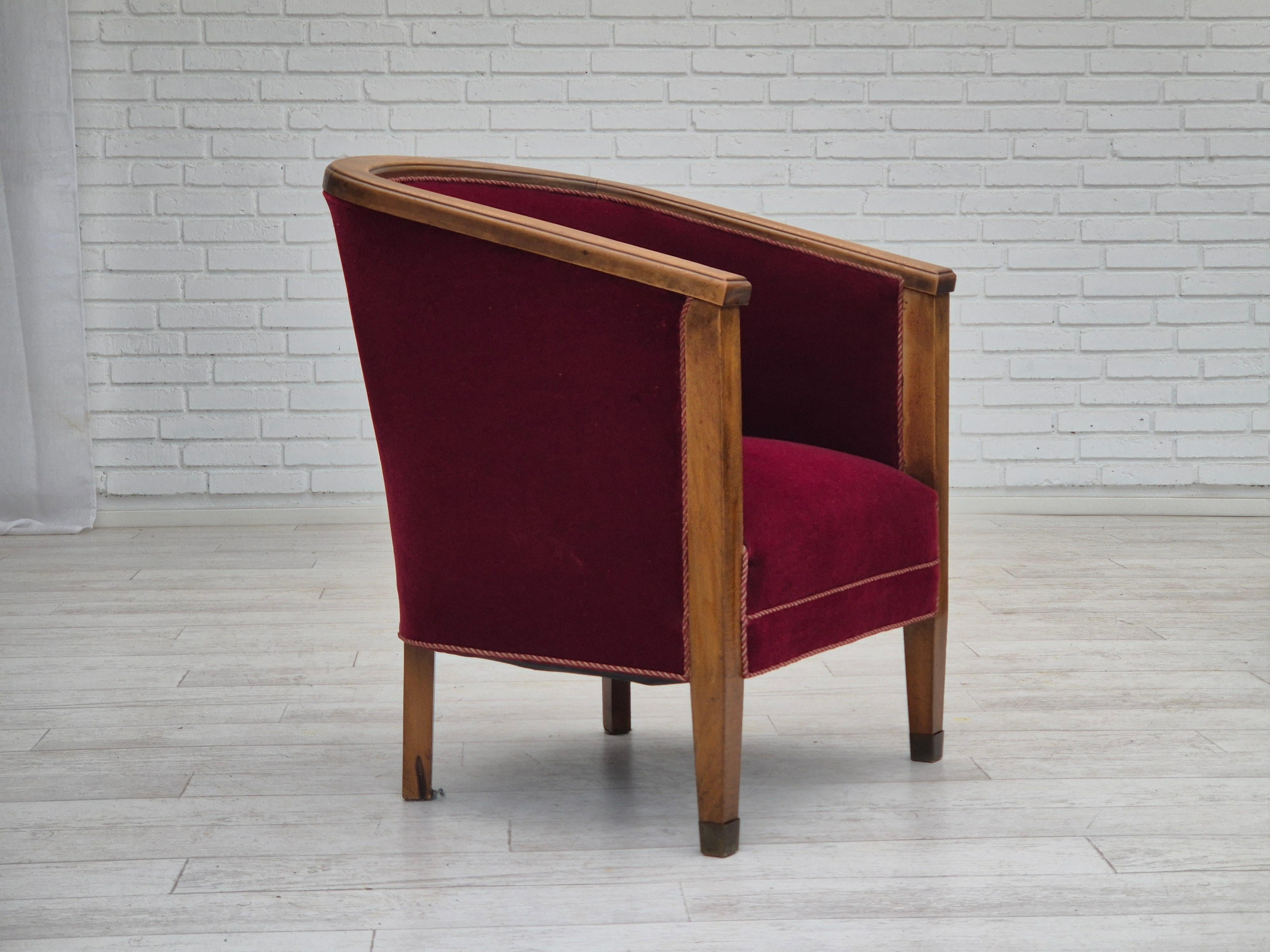1950s, Danish armchair in original very good condition: no smells and no stains. Cherry-red furniture velour, beech wood with brass plugs on the front legs. Springs in the seat. Manufactured in about 1950-55s.