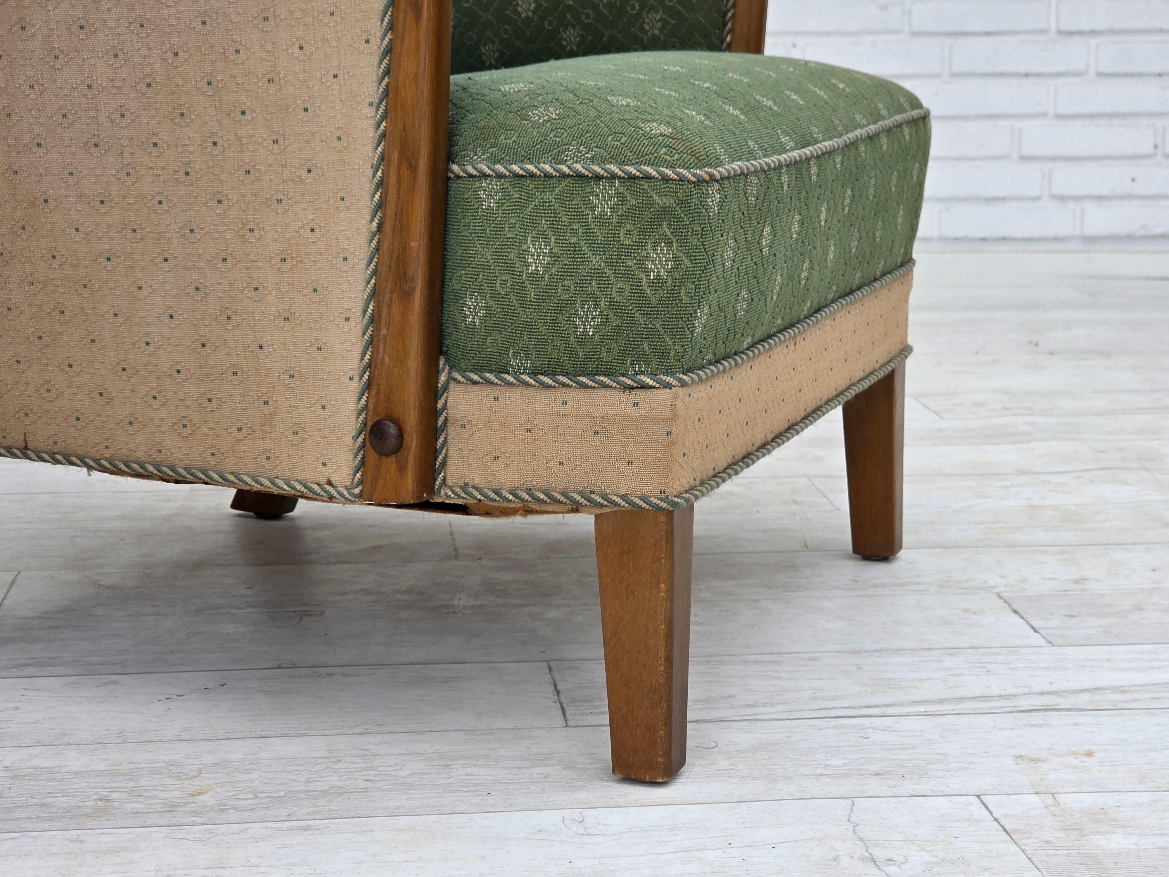 Scandinavian Modern 1950s, Danish armchair, original green/beige furniture wool fabric, oak wood. For Sale