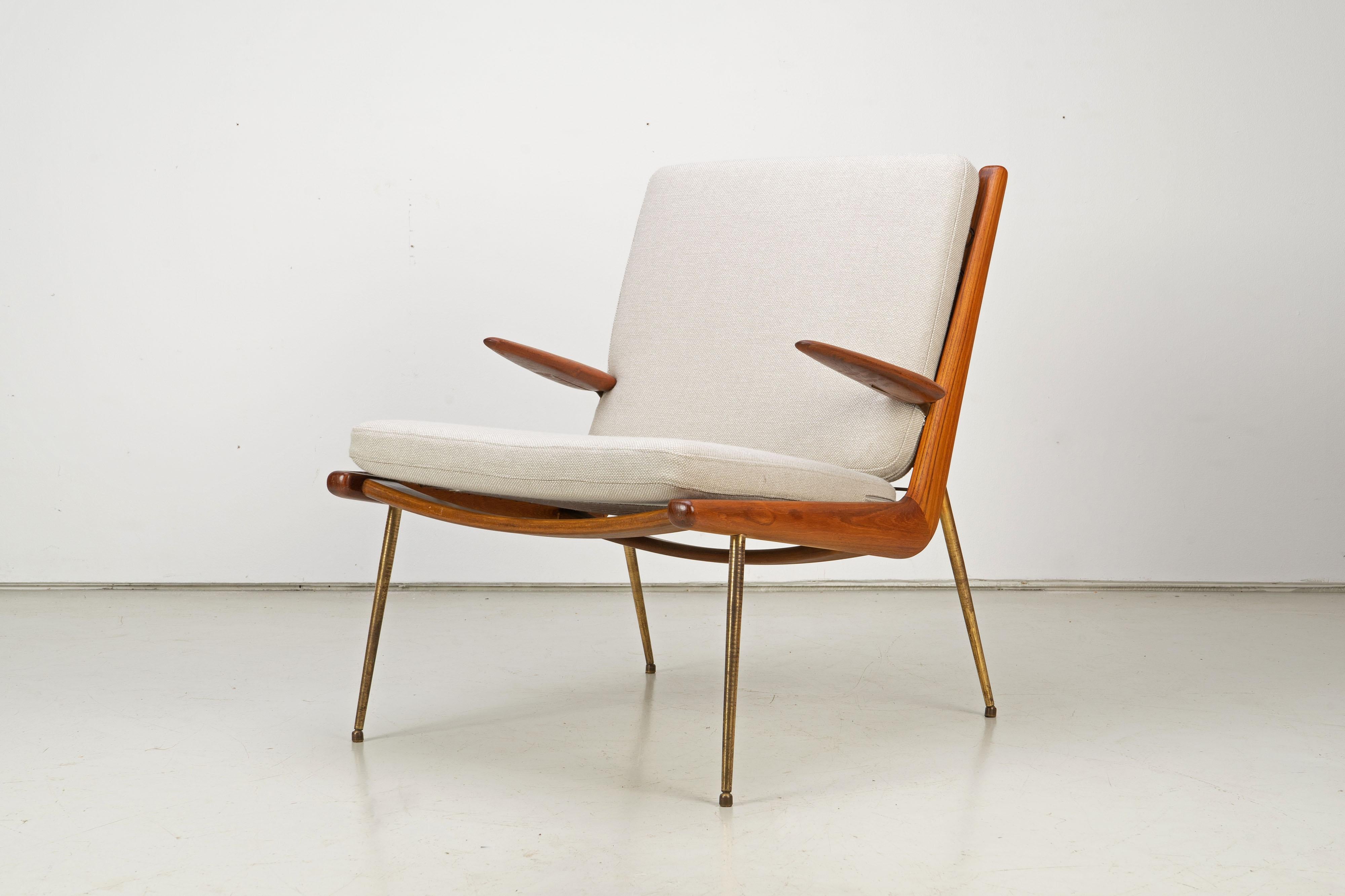 Filigree easy chair in teak with brass legs, designed by Peter Hvidt and Orla Molgaard Nielsen, produced by France & Daverkosen. The chair is in excellent, used condition. The upholstery has been renewed with fabric by Kvadrat. Labeled on the frame.