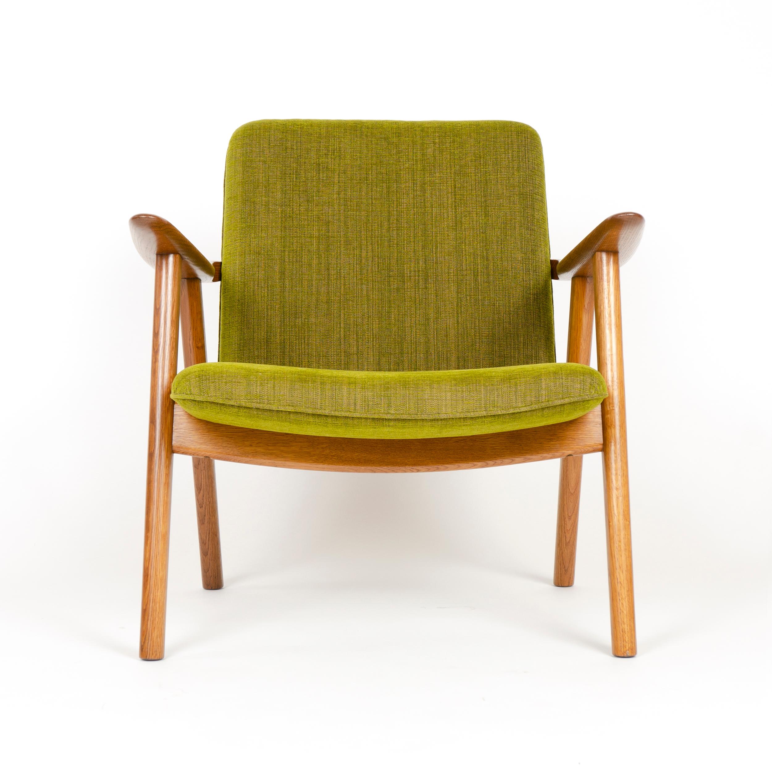 The 'Bukkestolen' (reading chair) with exposed solid oak frame and new internal upholstery and fabric. Priced per chair.