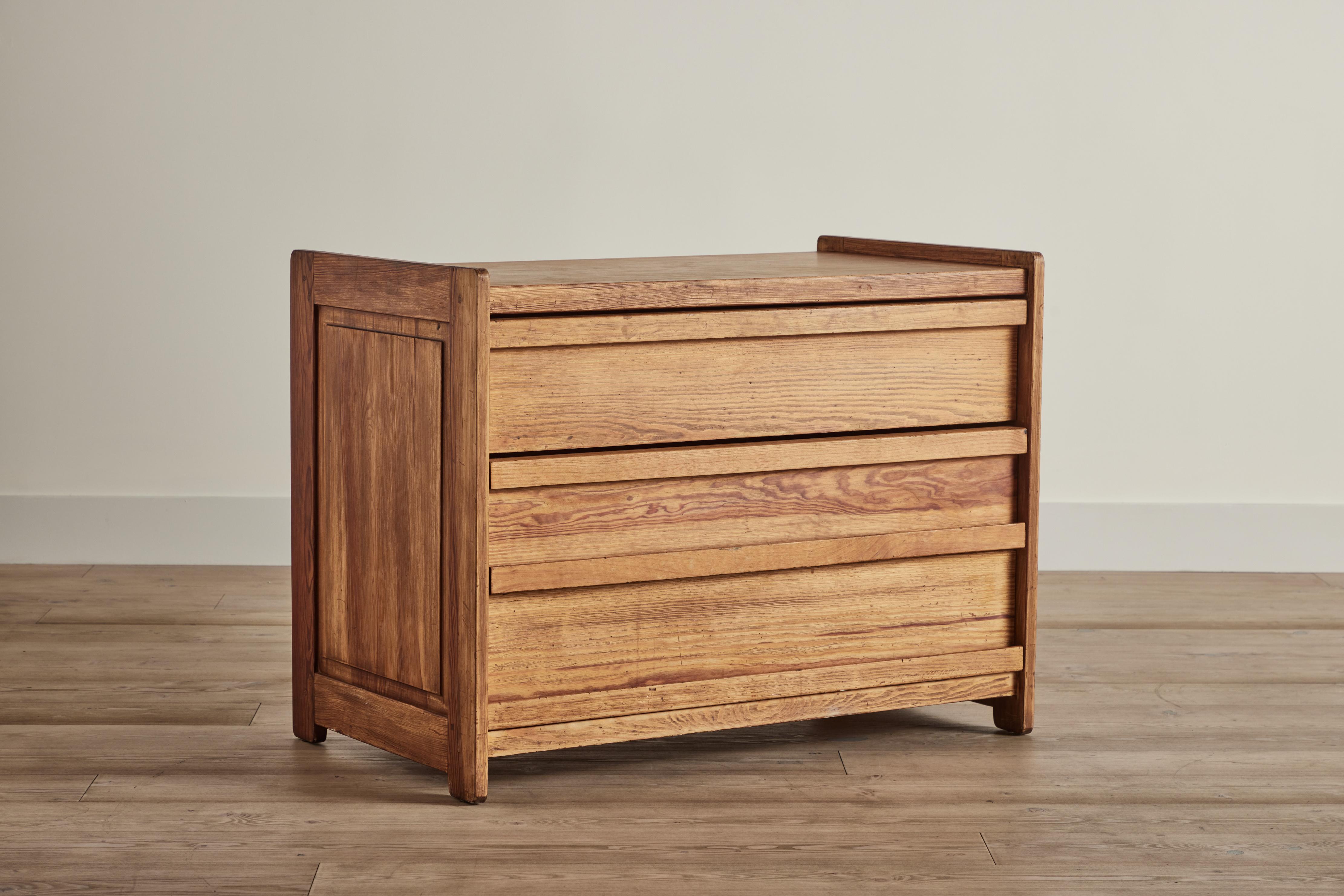 Small pine chest of three drawers from Denmark circa 1950. Wear on wood is consistent with age and use. 