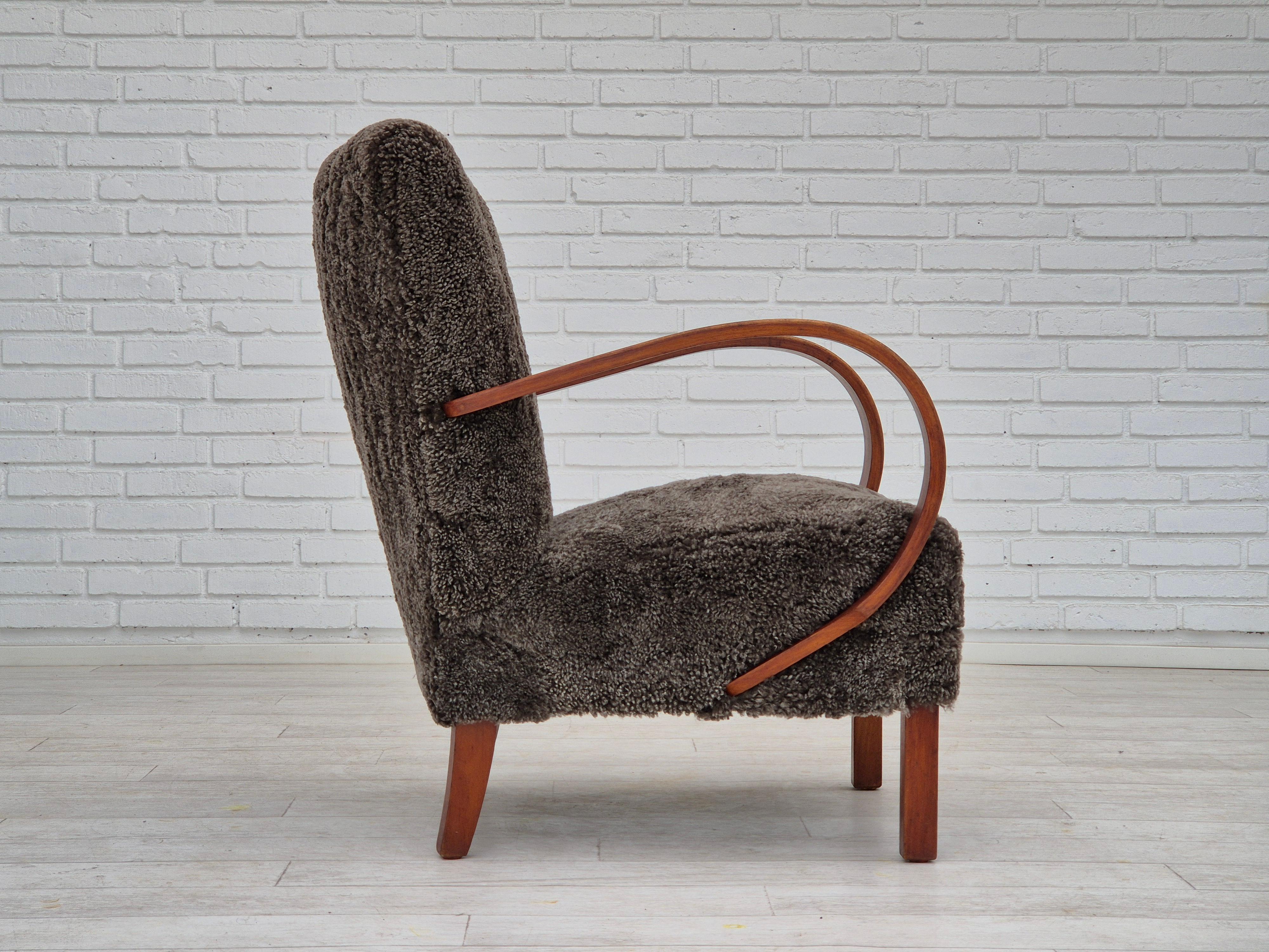 Mid-20th Century 1950s, Danish design, refurbished armchair, geniue sheepskin 