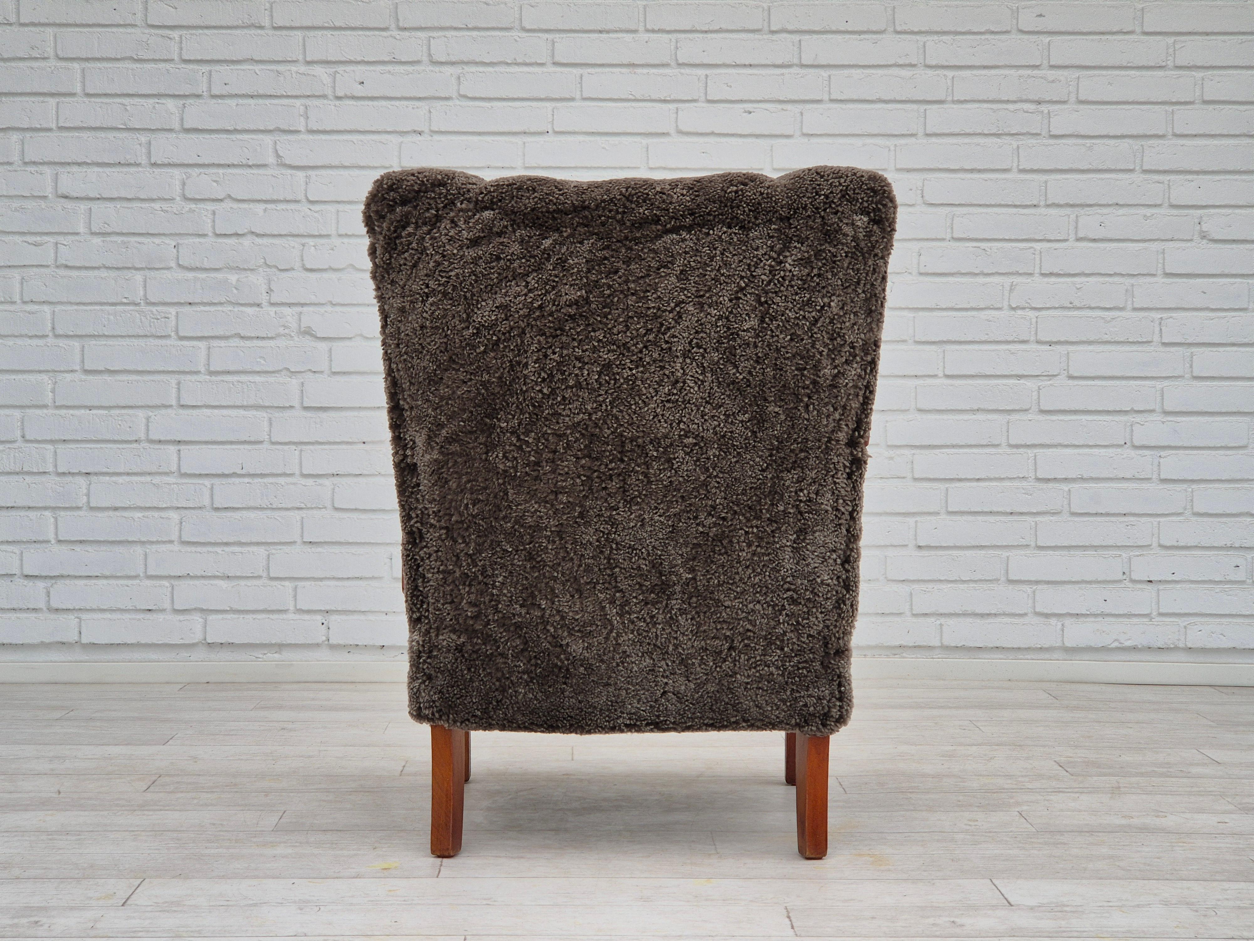 Lambskin 1950s, Danish design, refurbished armchair, geniue sheepskin 