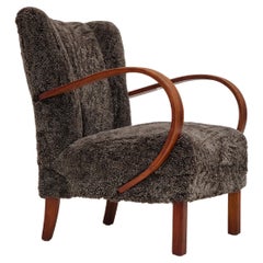 1950er Jahre, dänisches Design, aufgearbeiteter Sessel, geniales Schafsfell „Wellington“.