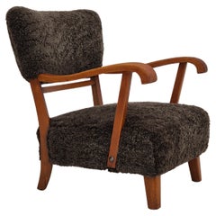 Vintage 1950s, Danish design, refurbished armchair, genuine sheepskin.