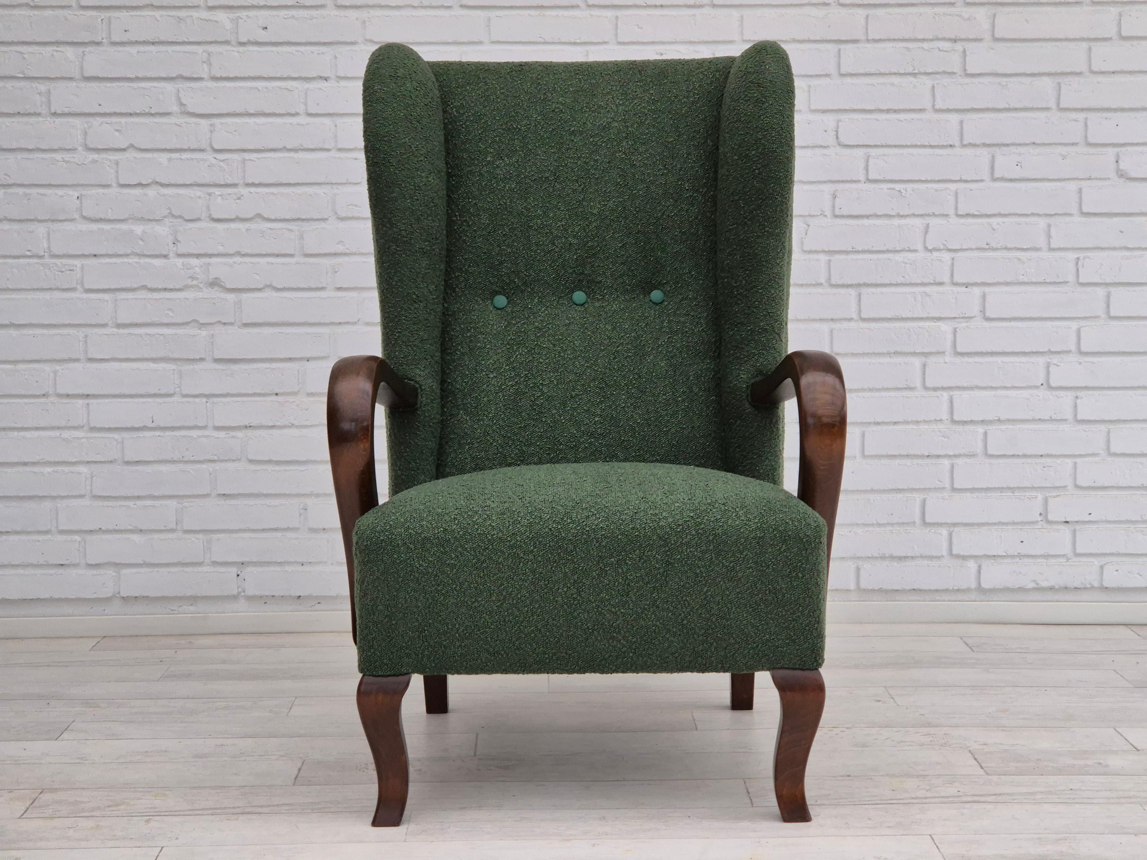 Scandinavian Modern 1950s, Danish design, restored high-back wingback chair, bottle green, beech  For Sale
