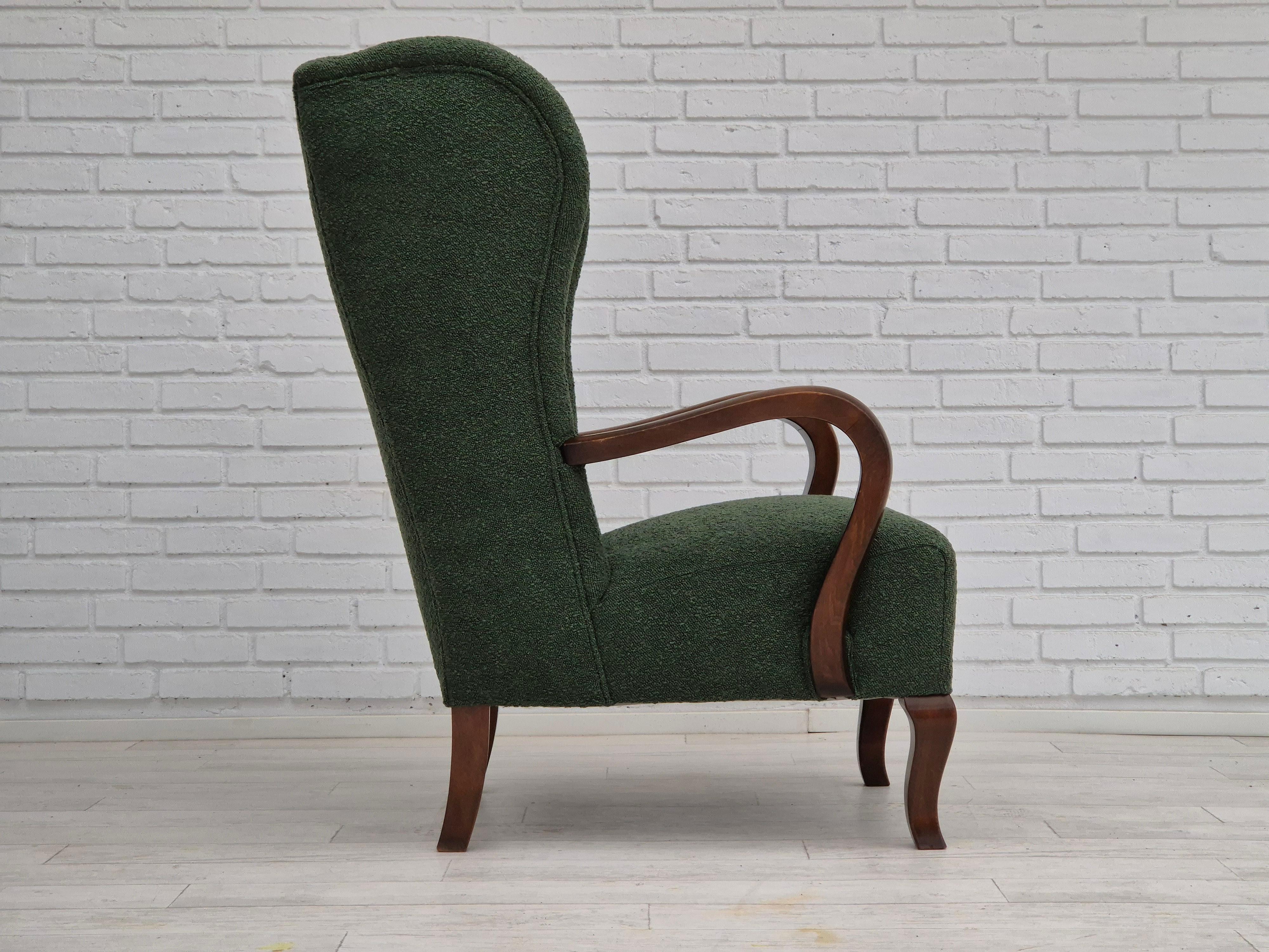 Mid-20th Century 1950s, Danish design, restored high-back wingback chair, bottle green, beech  For Sale