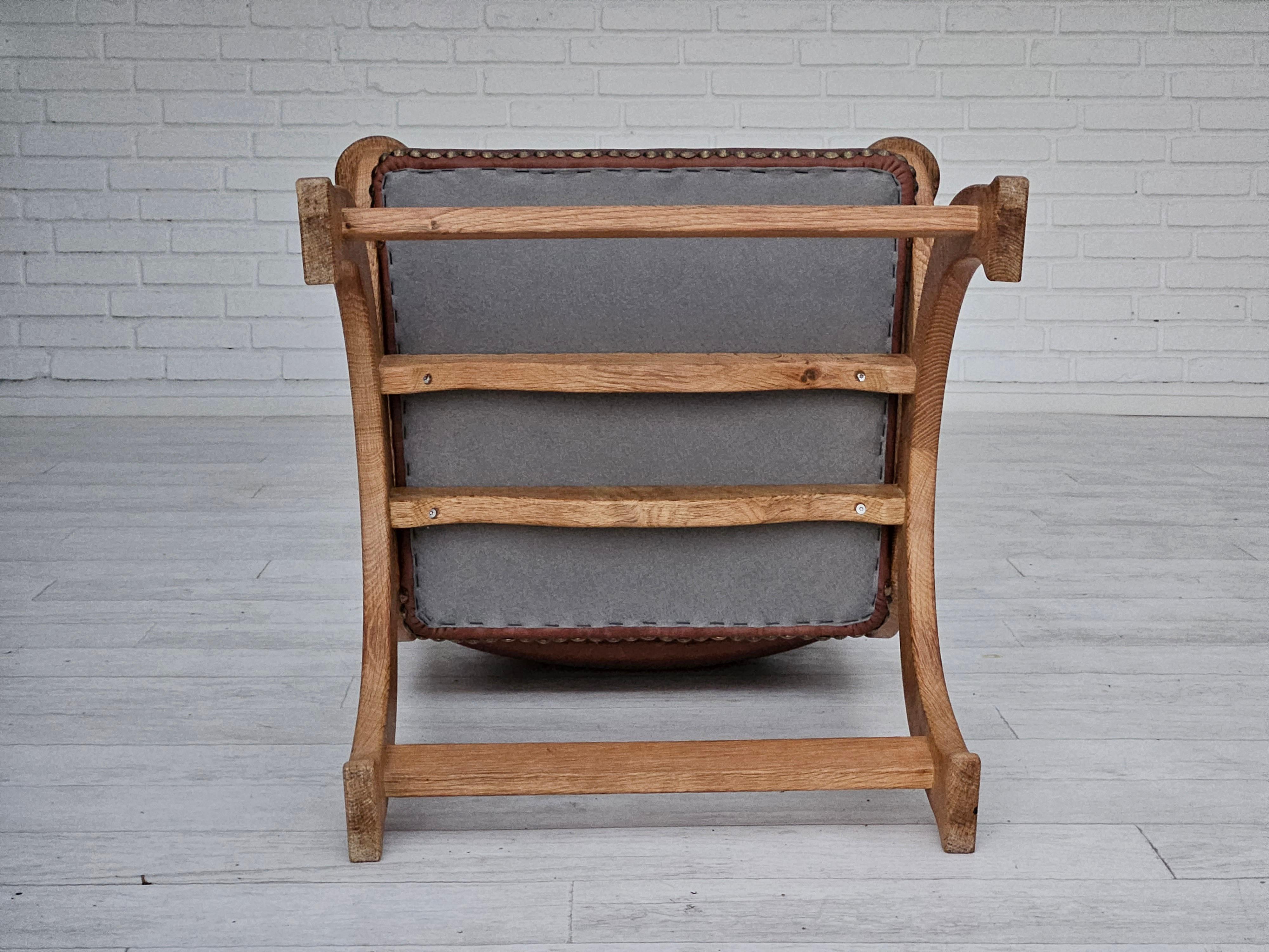 1950s, Danish design, reupholstered armchair, natural brown leather, oak wood. For Sale 9