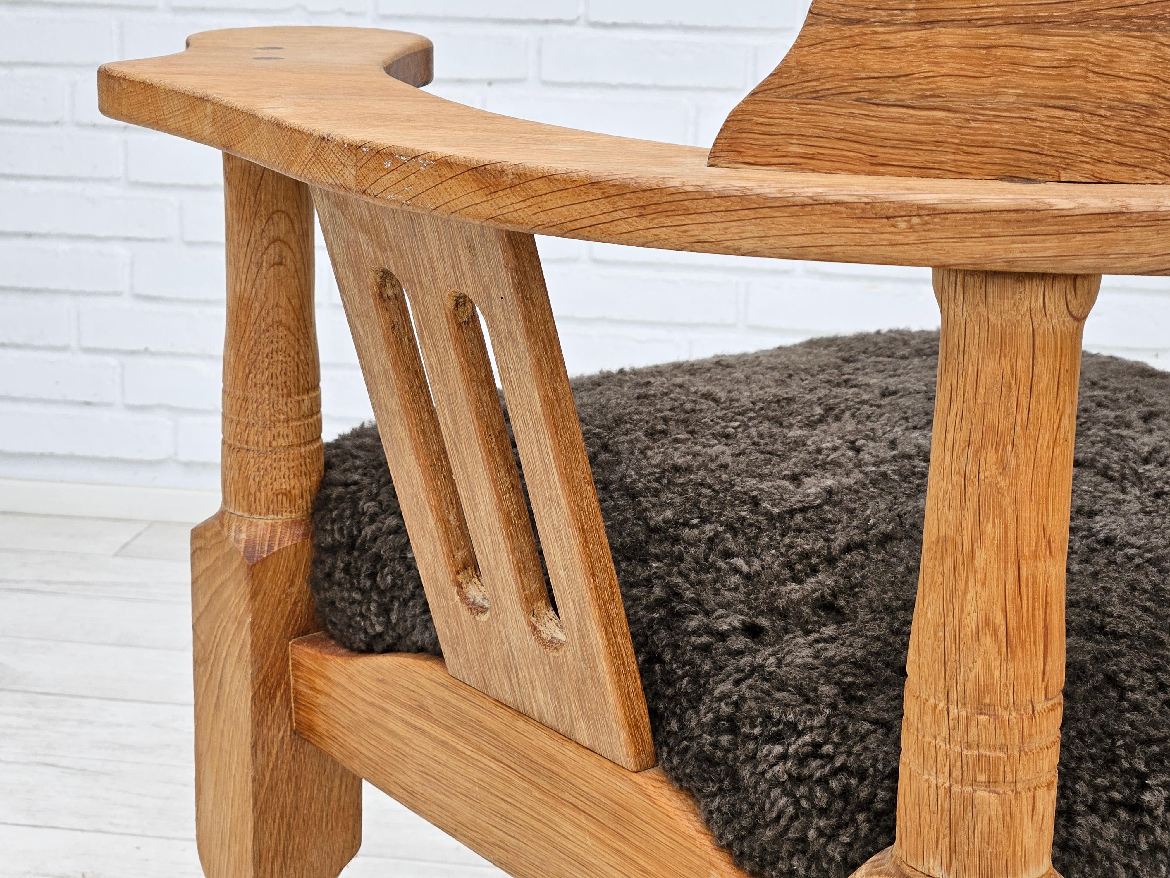 1950s, Danish design, reupholstered armchair, New Zealand sheepskin, oak wood. For Sale 7