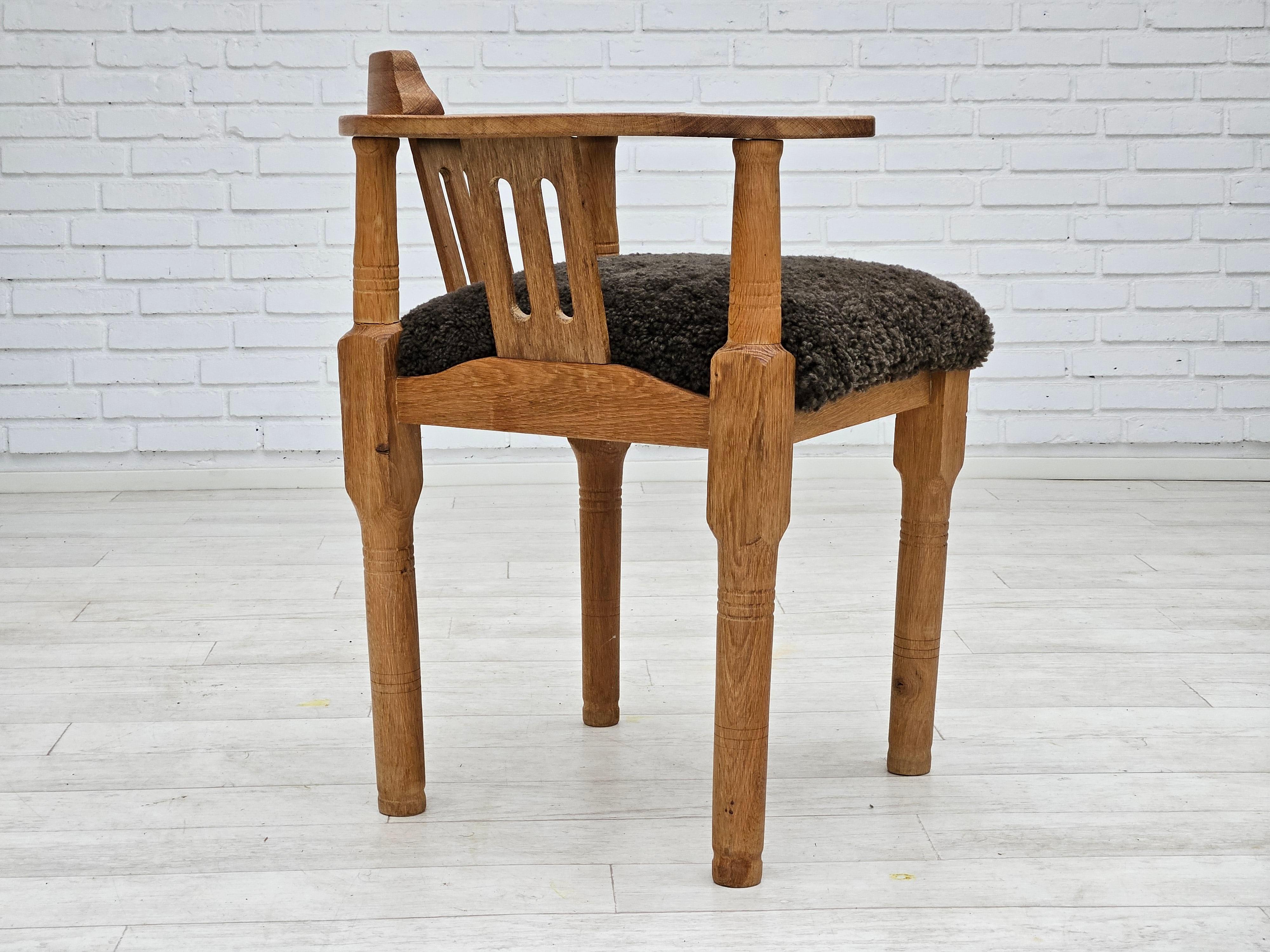 1950s, Danish design, reupholstered armchair, New Zealand sheepskin, oak wood. In Good Condition For Sale In Tarm, 82