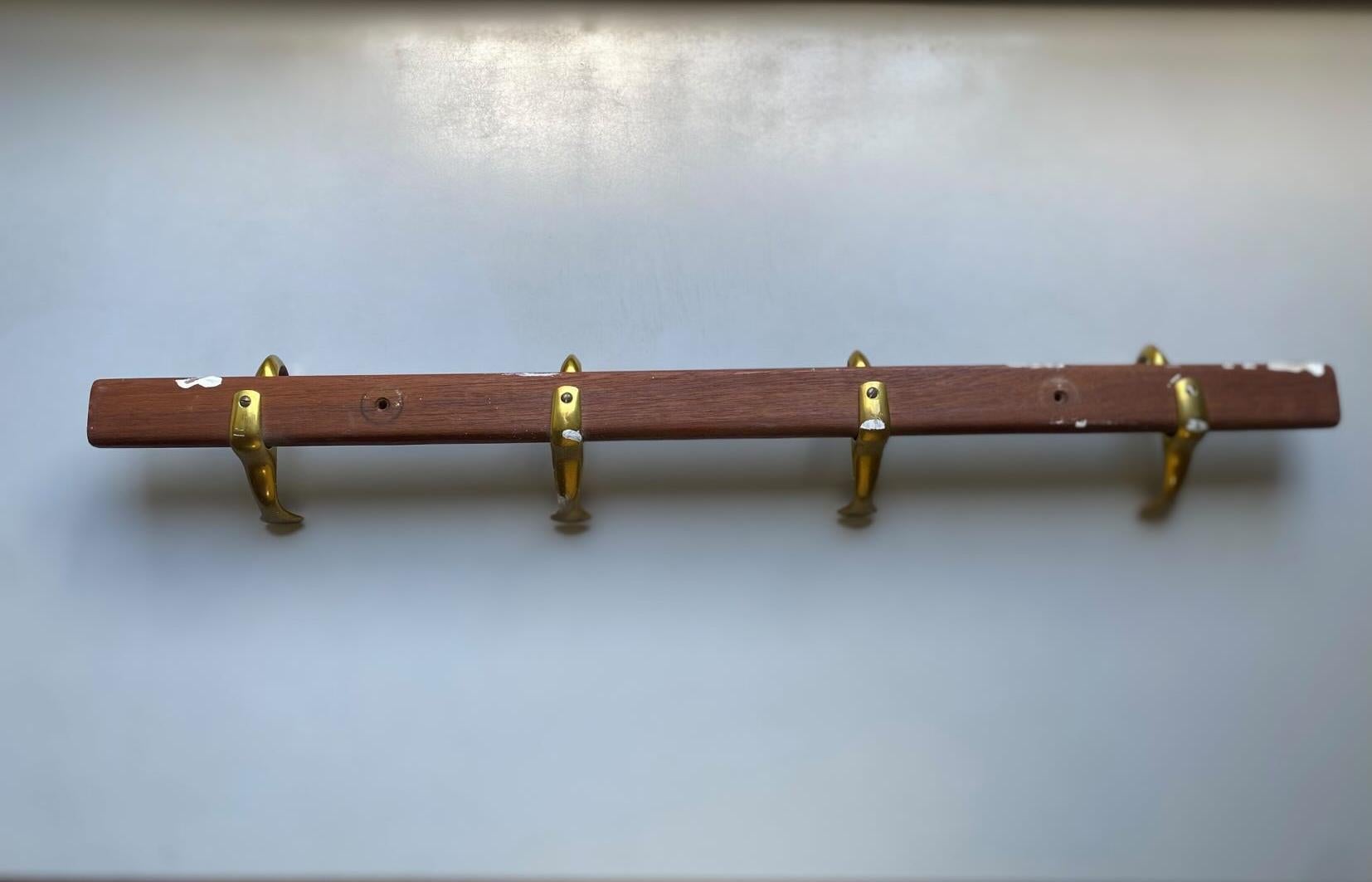 Brass 1950s Danish design solid teak and brass hall coat rack For Sale