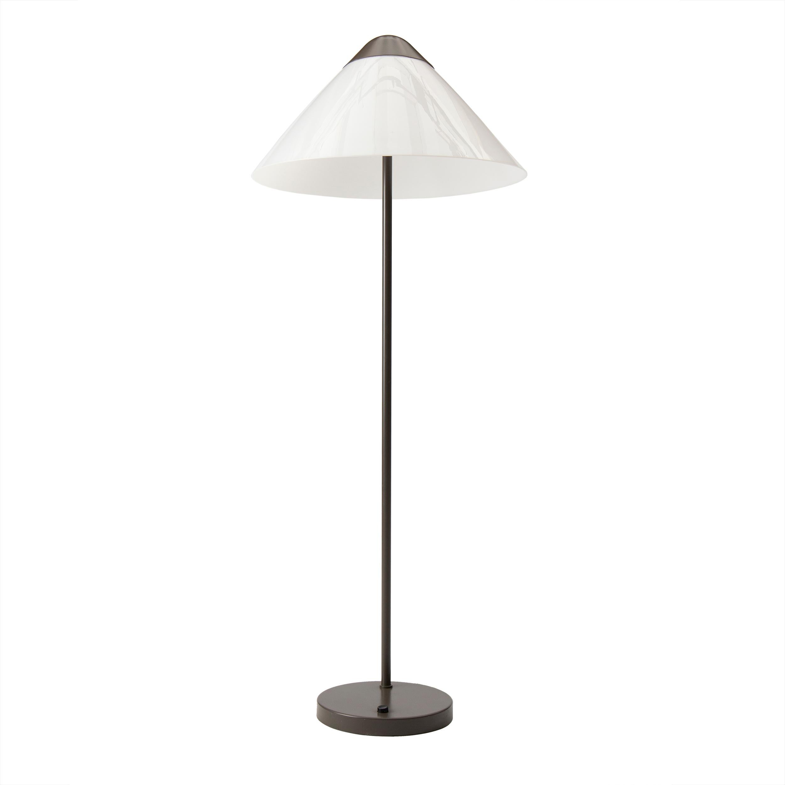 A Scandinavian floor lamp with a modern plexi glass cone shade and grey lacquered steel stem.