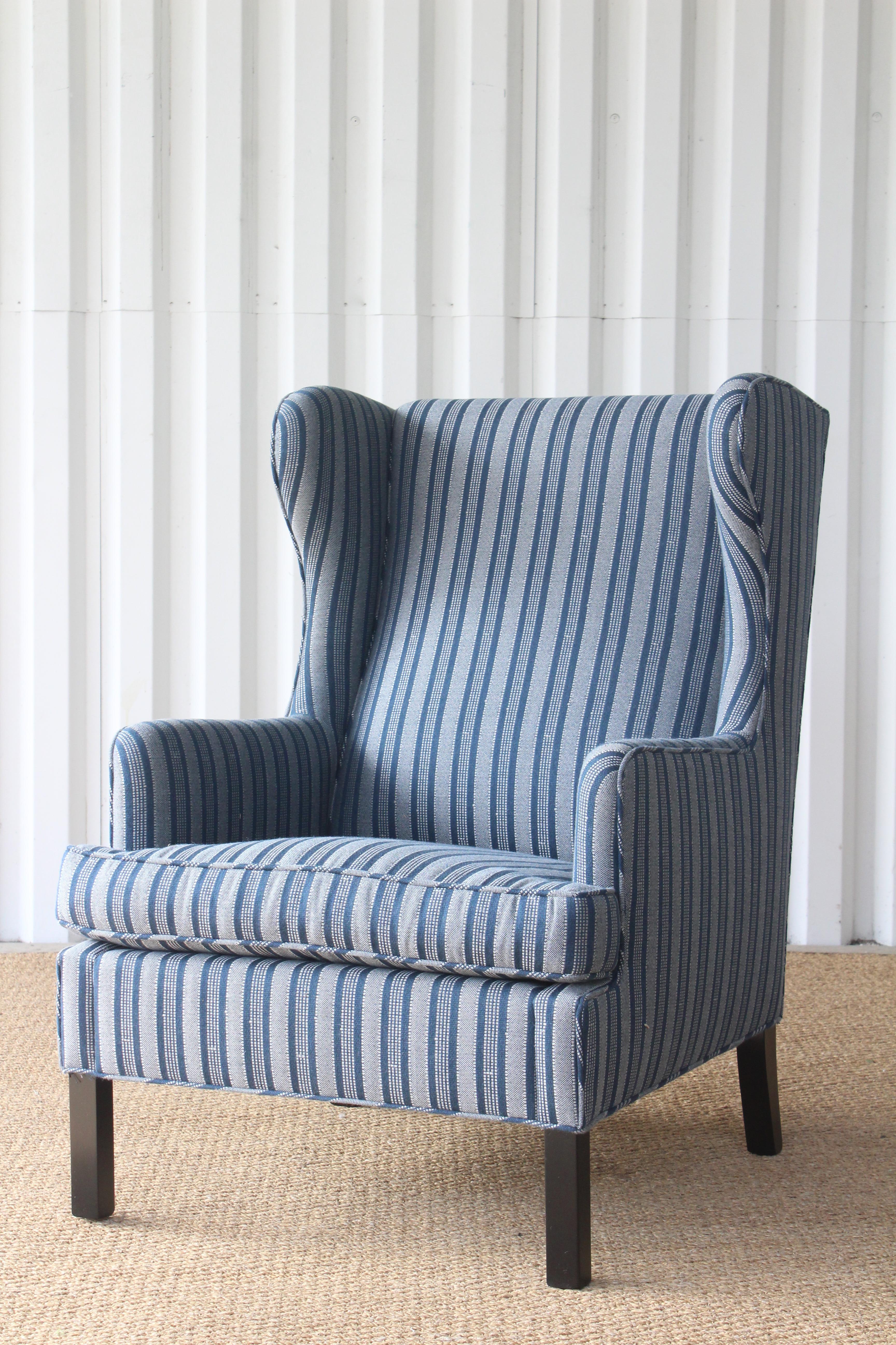 Vintage 1950s Danish high back wing chair. Restored with new upholstery in Peter Dunham Textiles 'Amida'- made from 100% Sunbrella yarns. The fabric is a performance woven and is fade-resistant and easy to clean for worry-free living. The legs have