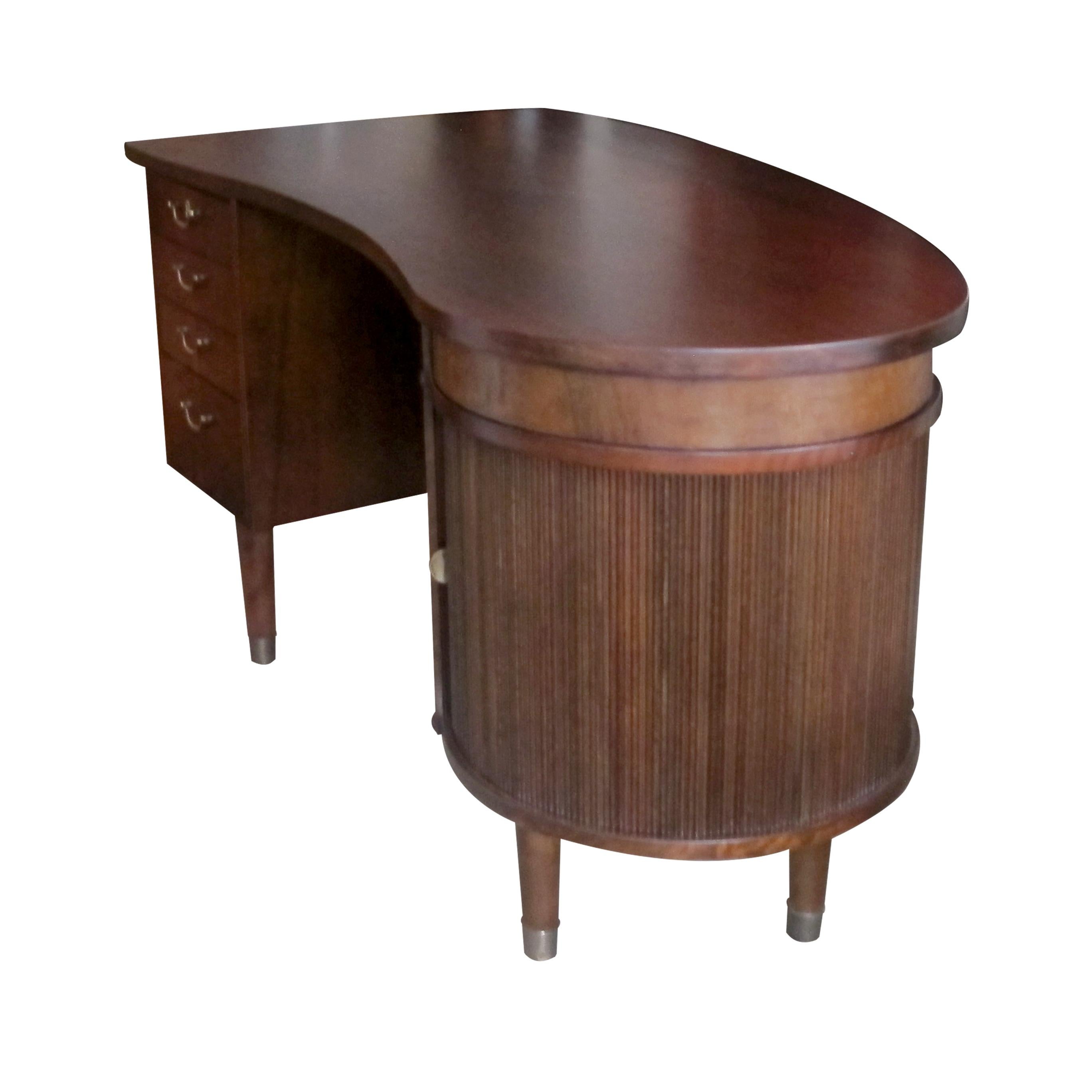 A beautiful, mid century, 1960s, mahogany writing desk designed by Kai Kristiansen and made by Feldballes Møbelfabrik. This kidney shaped desk is a real statement of elegance with generous curves and an interjection of straight lines. The front