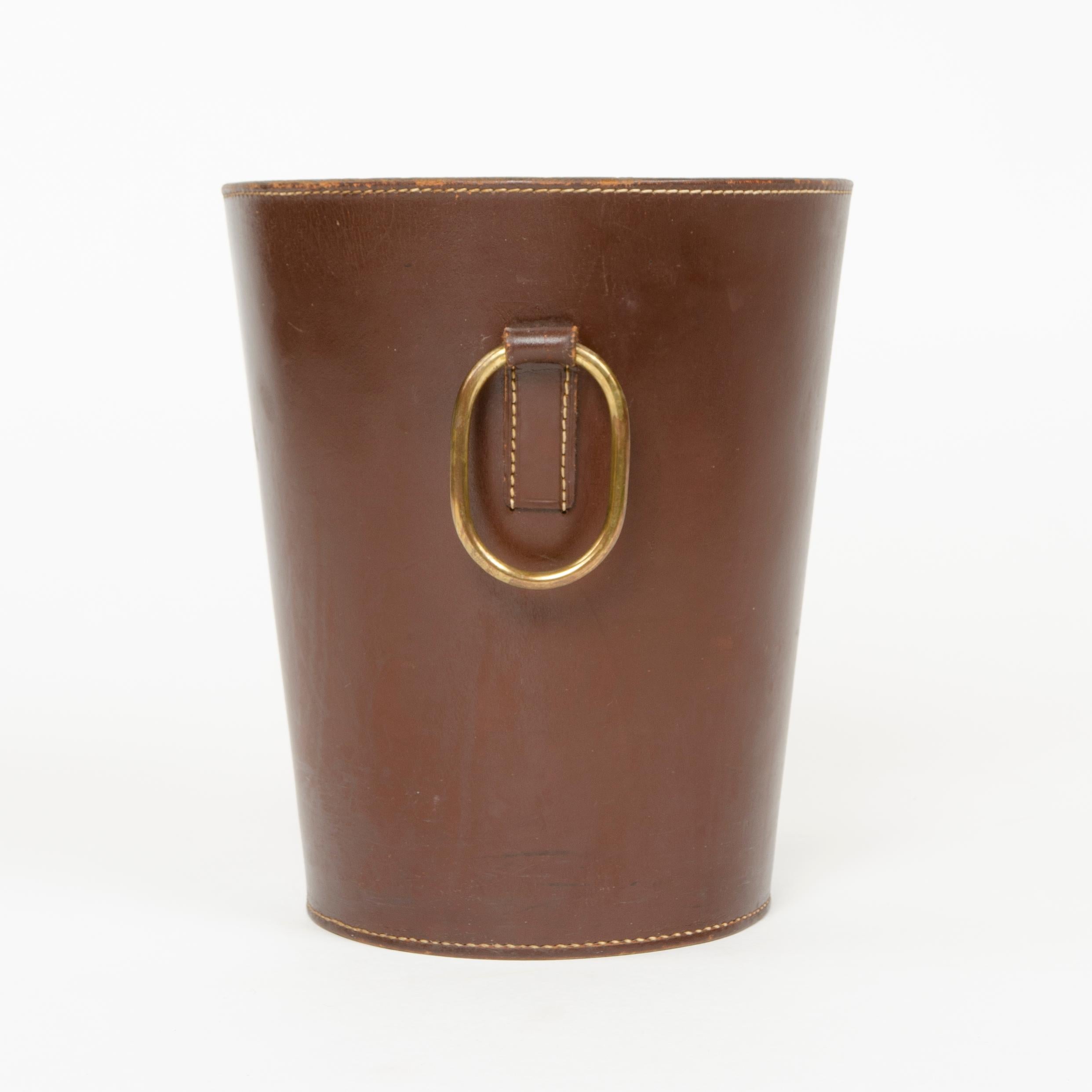 Fine quality leather ‘Paper Basket’ with brass ring handles as sold by Illums Bolighus (Copenhagen) in the early 1950s.